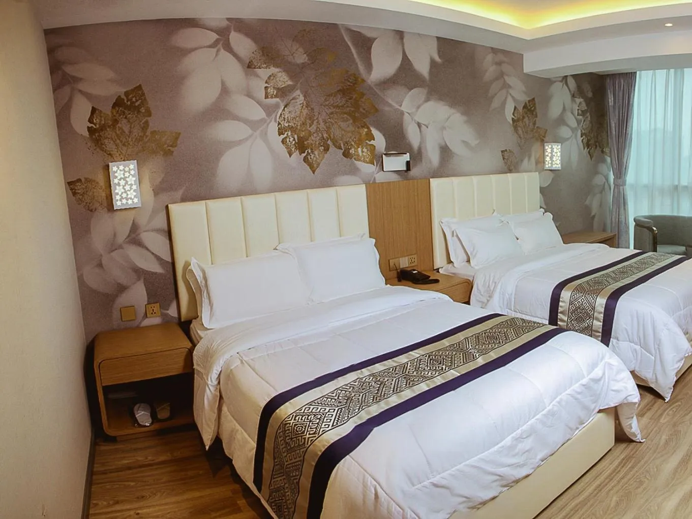 Photo of the whole room, Bed in Gold Source Hotel
