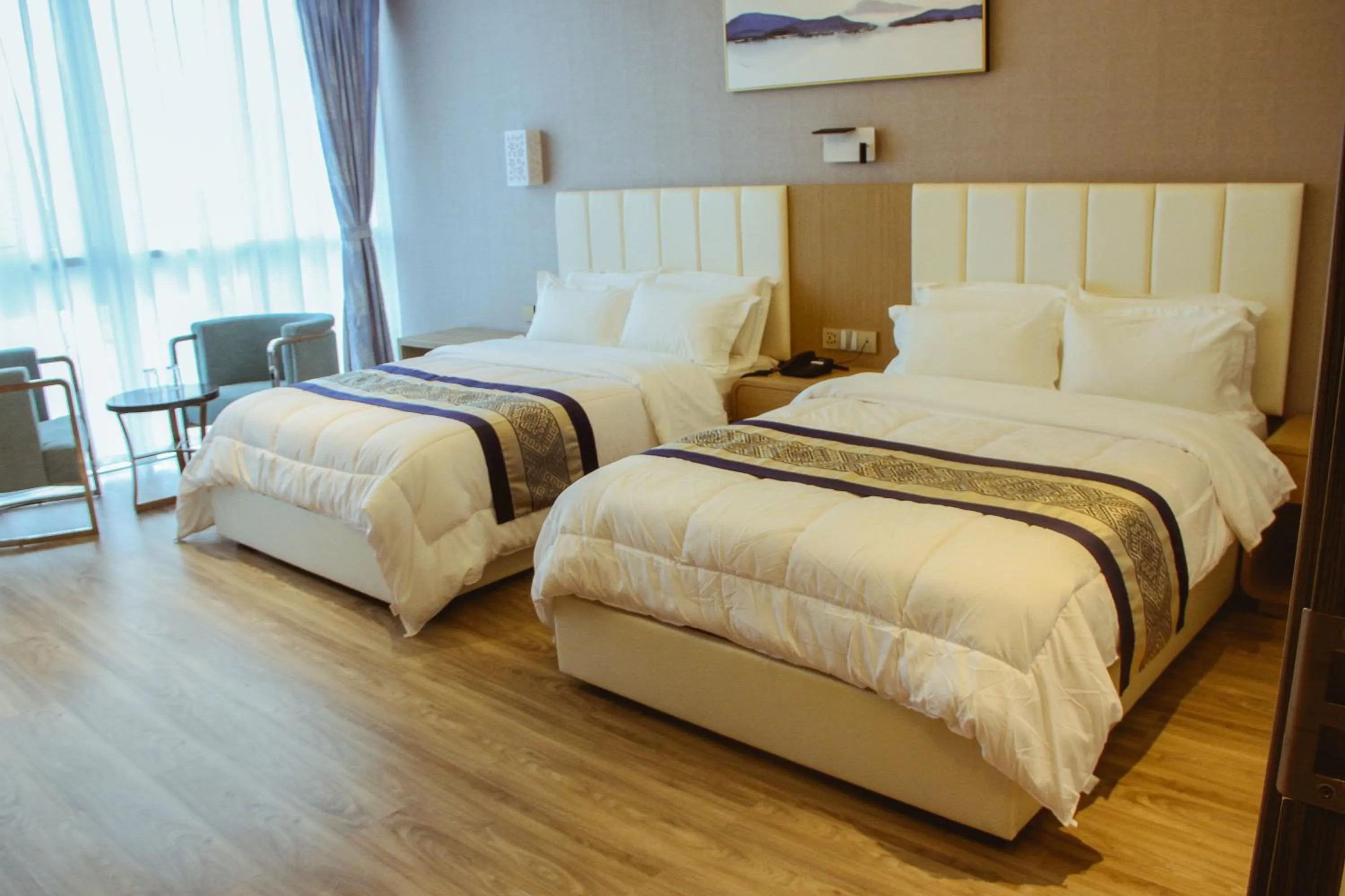 Photo of the whole room, Bed in Gold Source Hotel