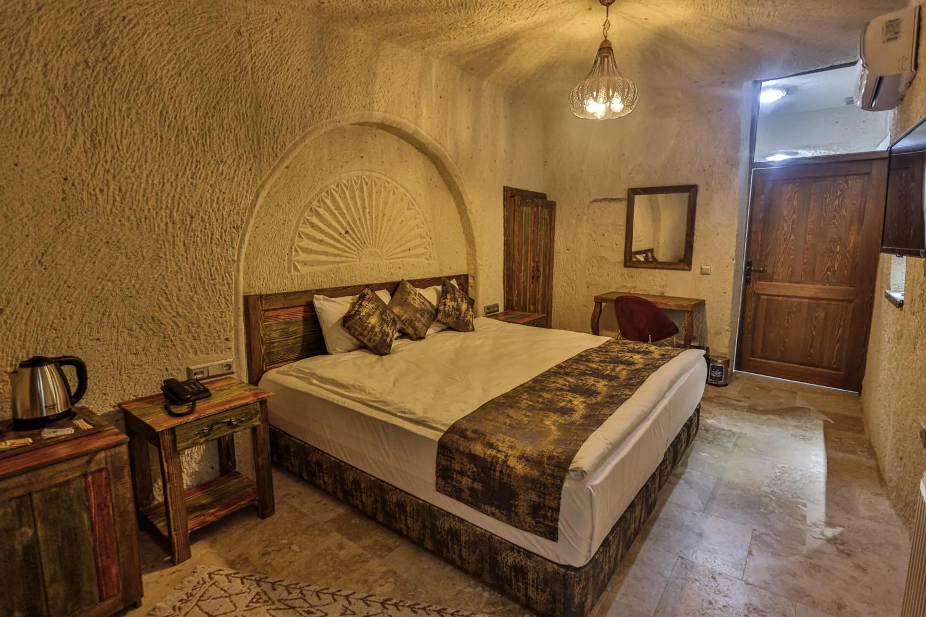 Photo of the whole room, Bed in CaveAdocia Stone&Cave Hotel