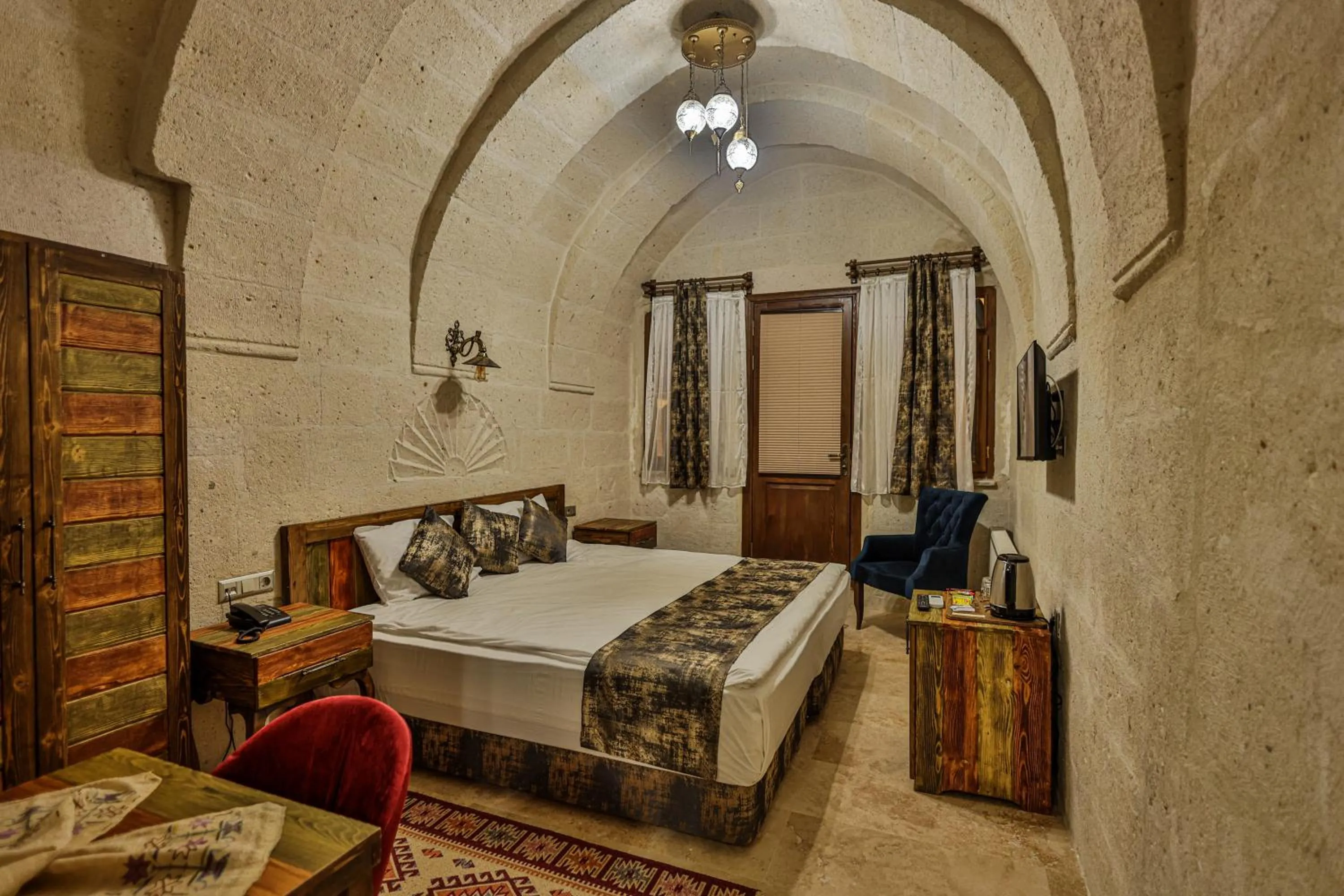 Bed in CaveAdocia Stone&Cave Hotel