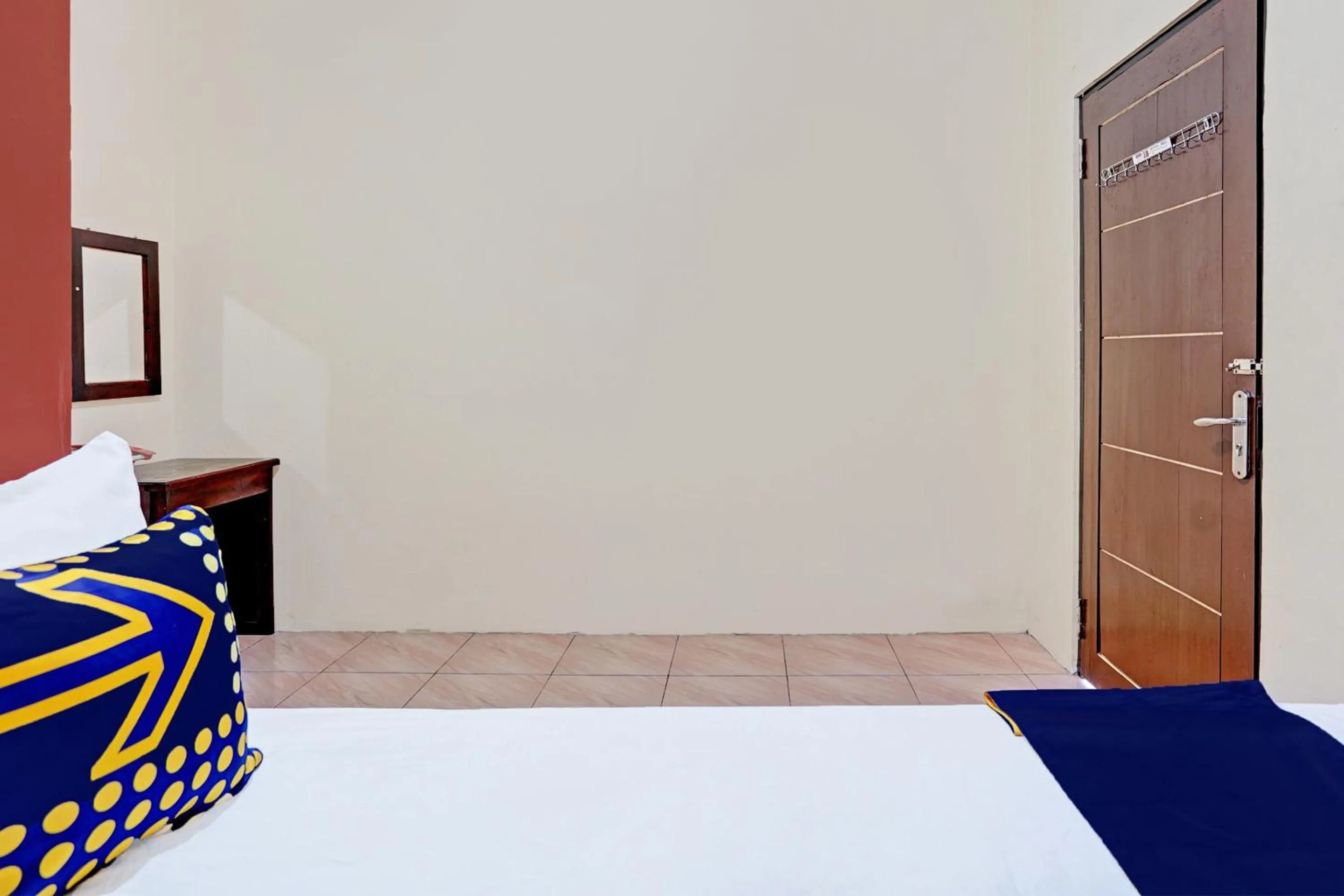 Bedroom in Hotel O Penginapan Kangean SyariahNearTaman Merdeka Kalianget