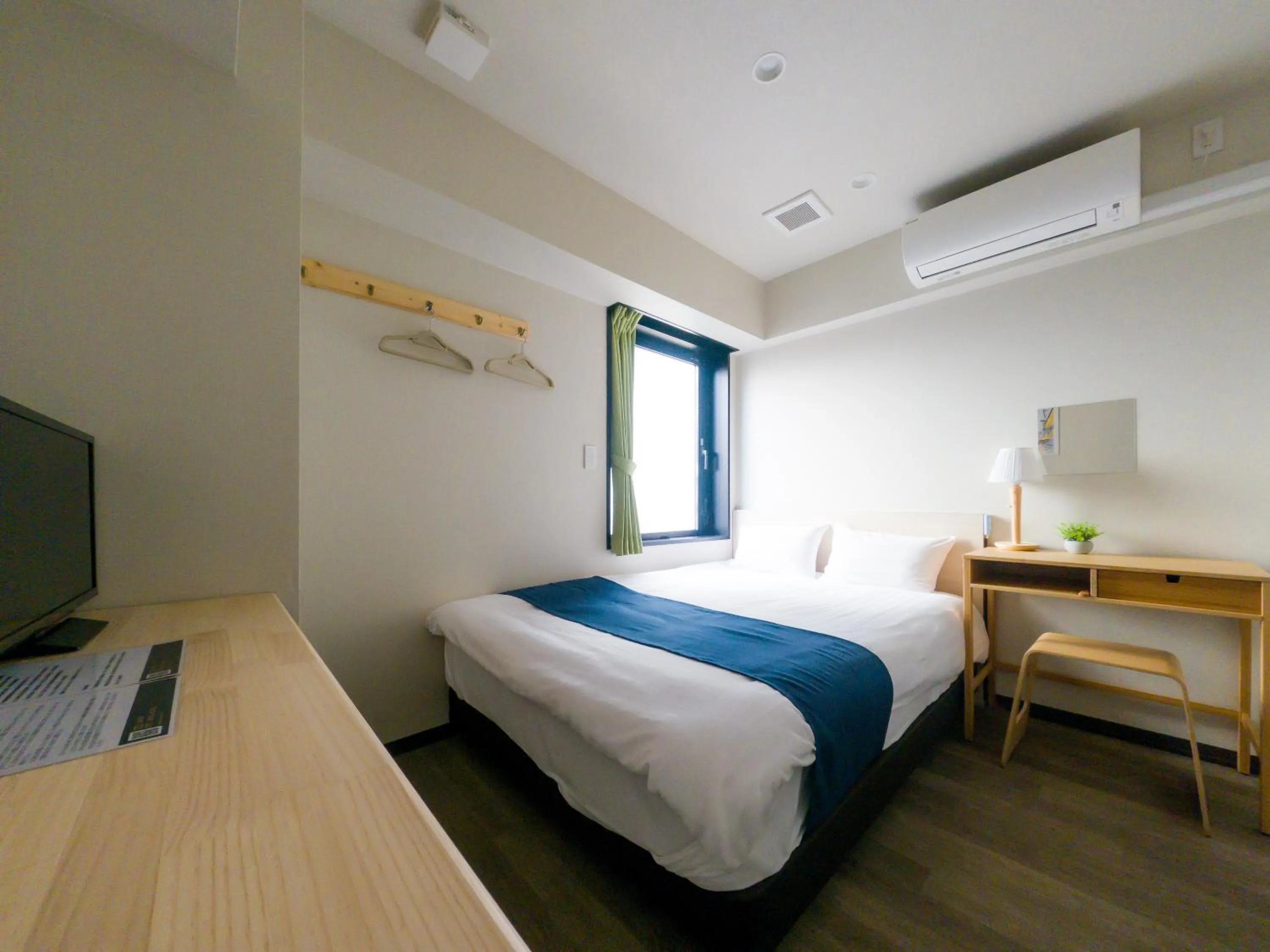 Bed in Ueno Woo Hotel