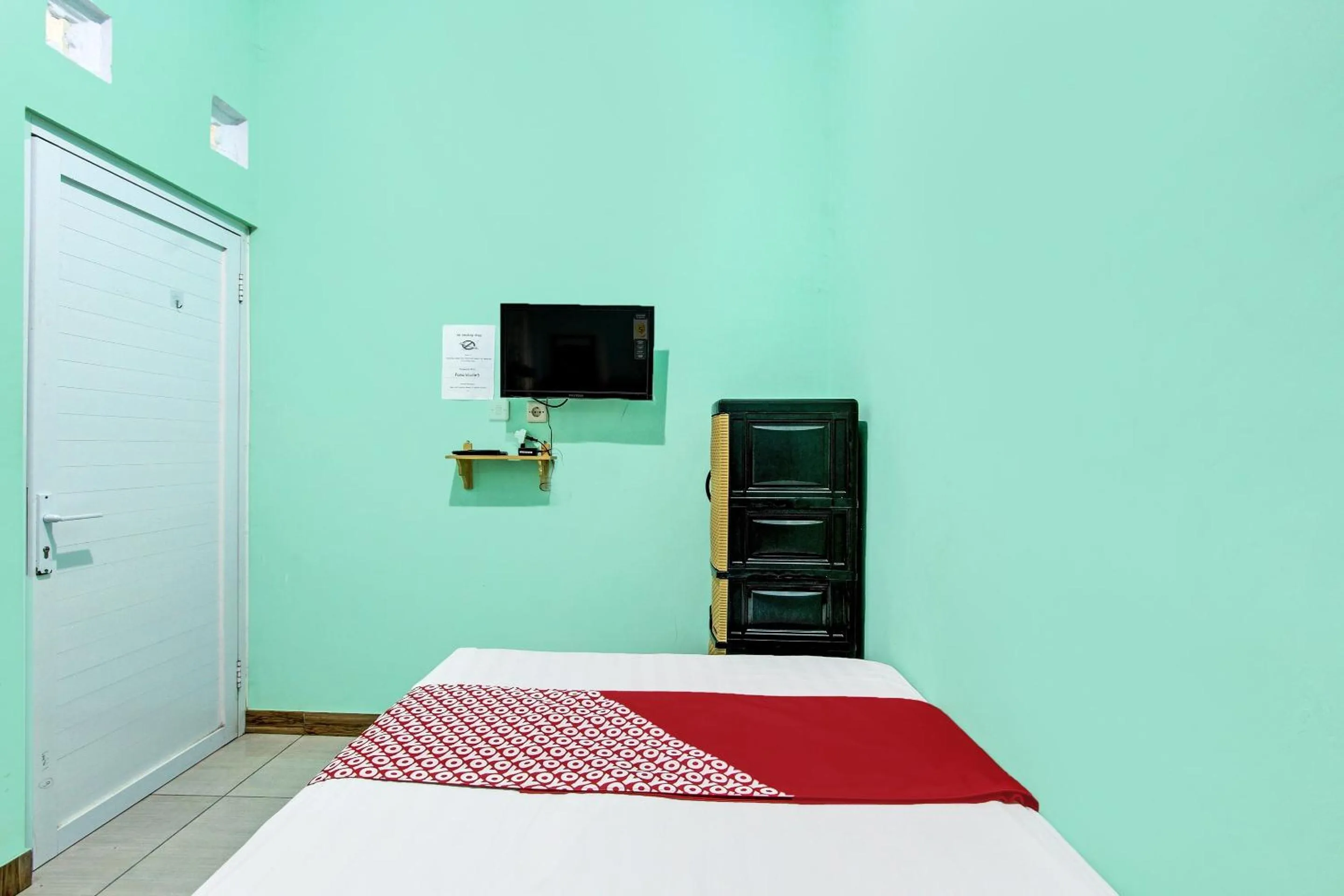 Bedroom in Hotel O Guest House Inayah Syariah