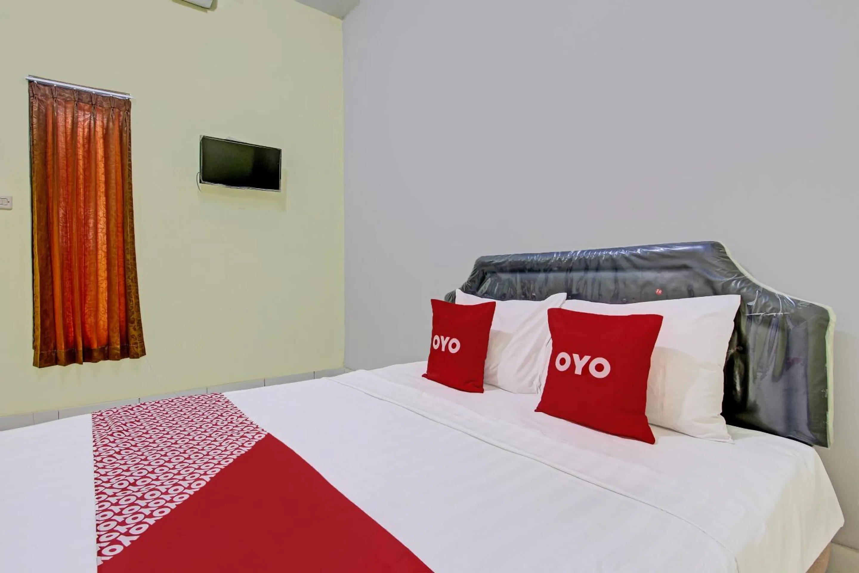 Bedroom in Hotel O Guest House Inayah Syariah