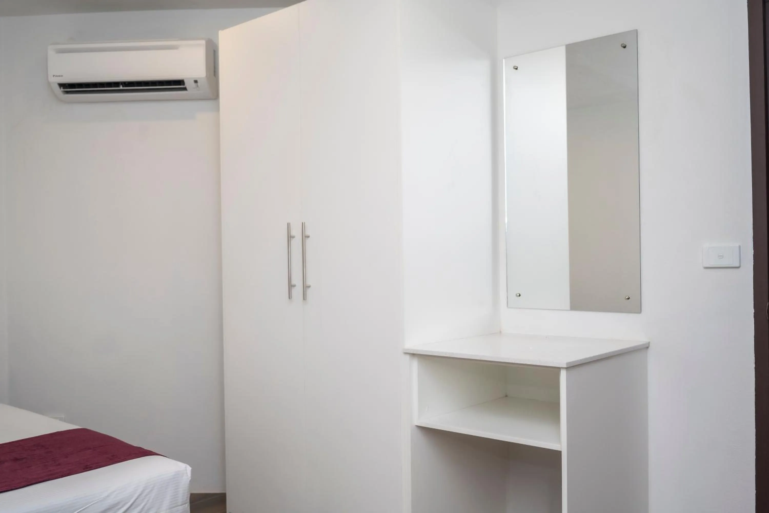 wardrobe, Bed in Garden Apartments