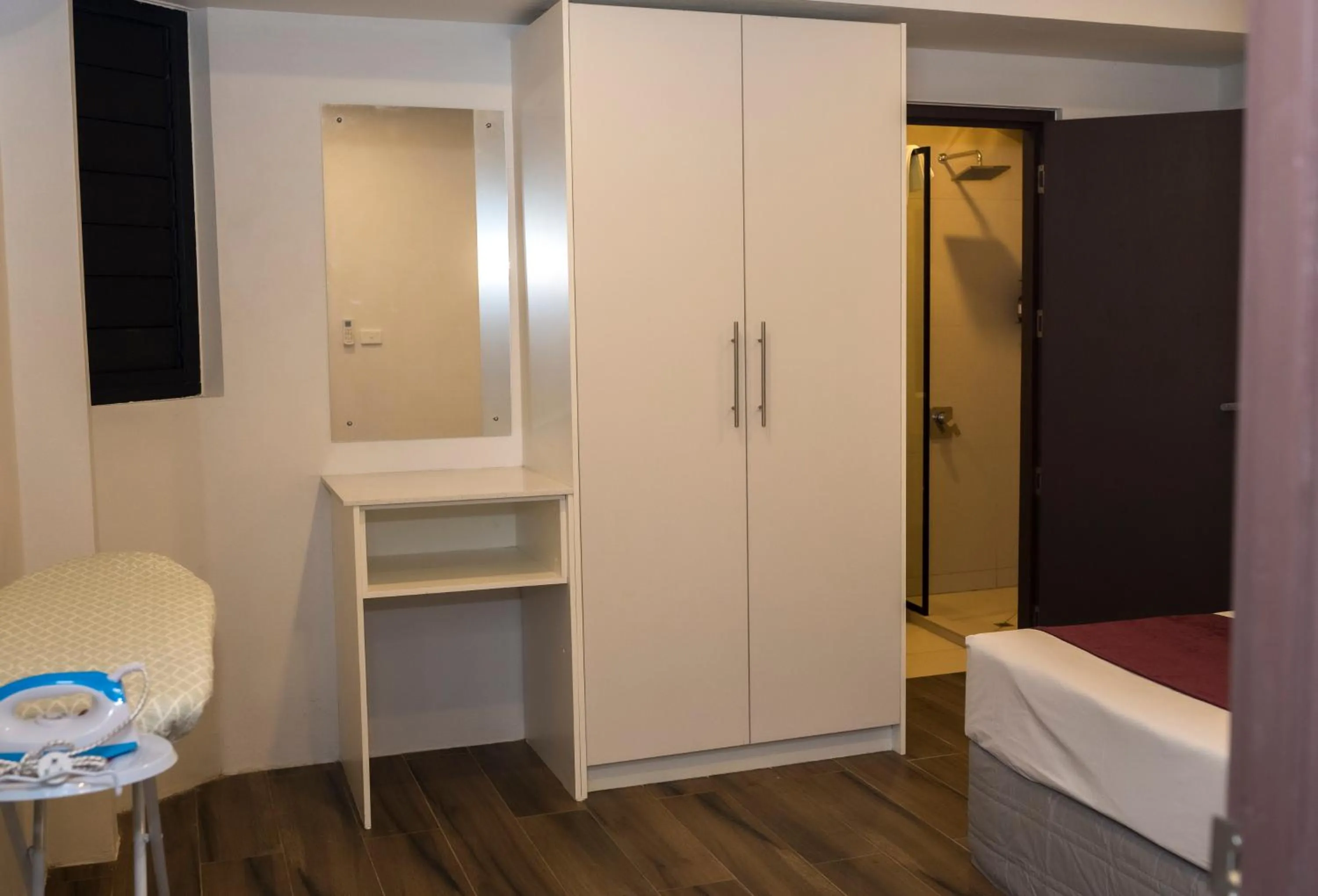 wardrobe, Bed in Garden Apartments