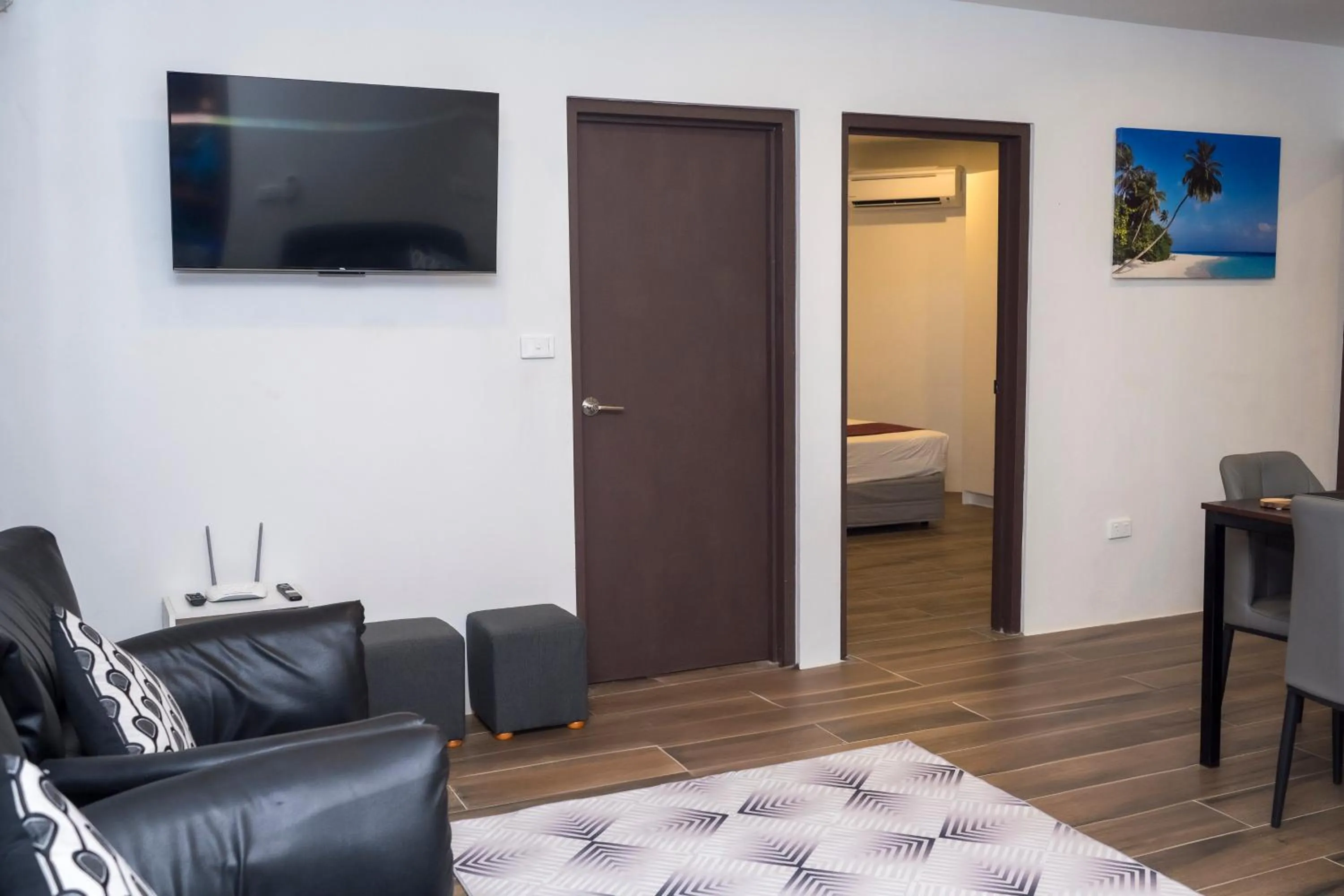 Living room, Bed in Garden Apartments