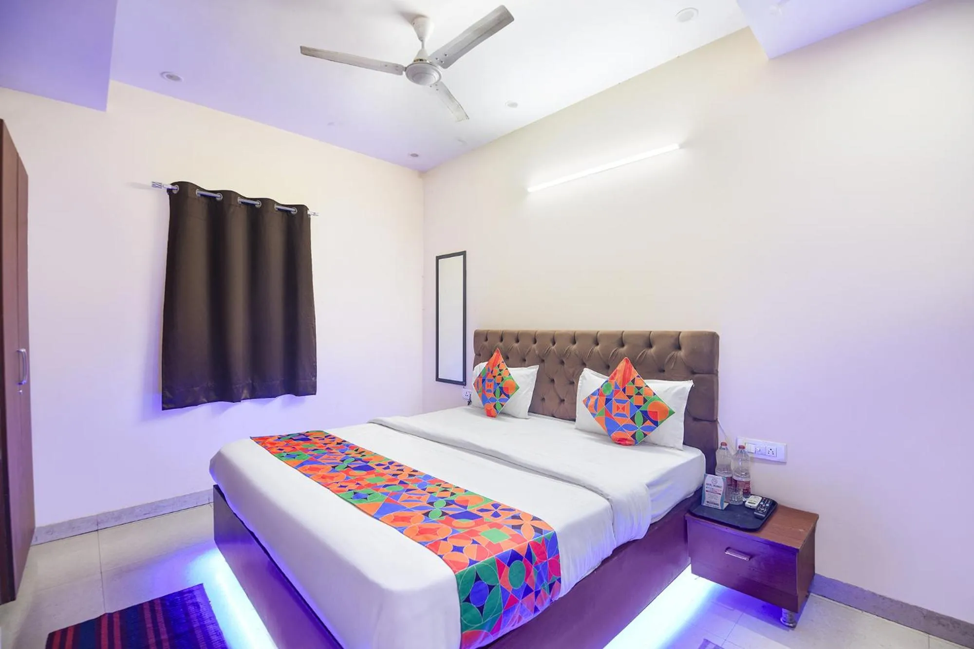 Bed in FabHotel Mannat Bhera Enclave