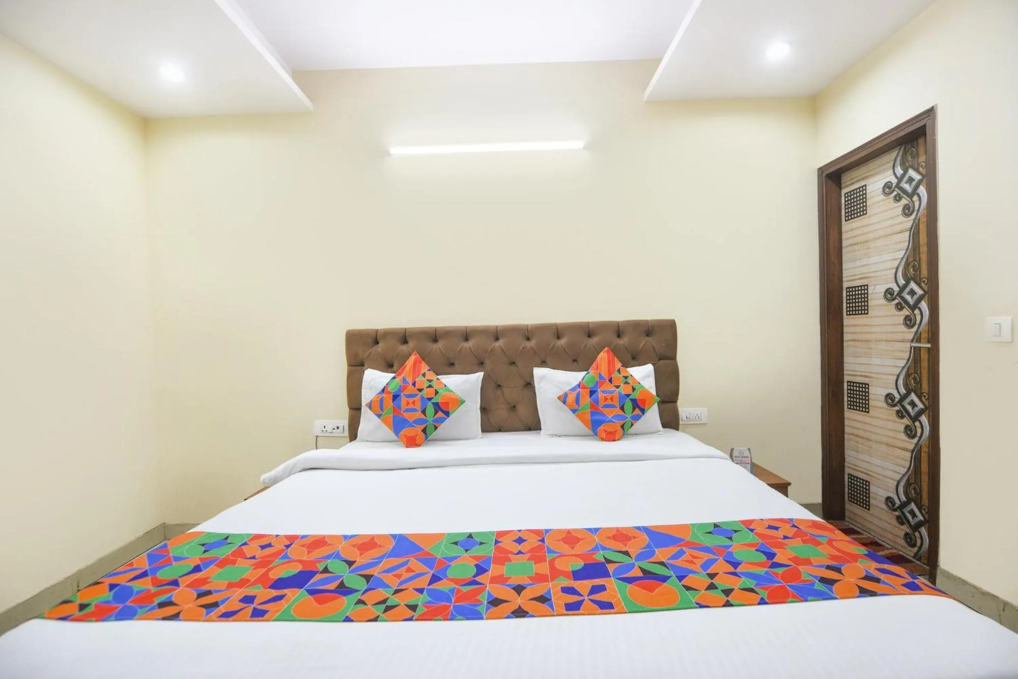 Bed in FabHotel Mannat Bhera Enclave