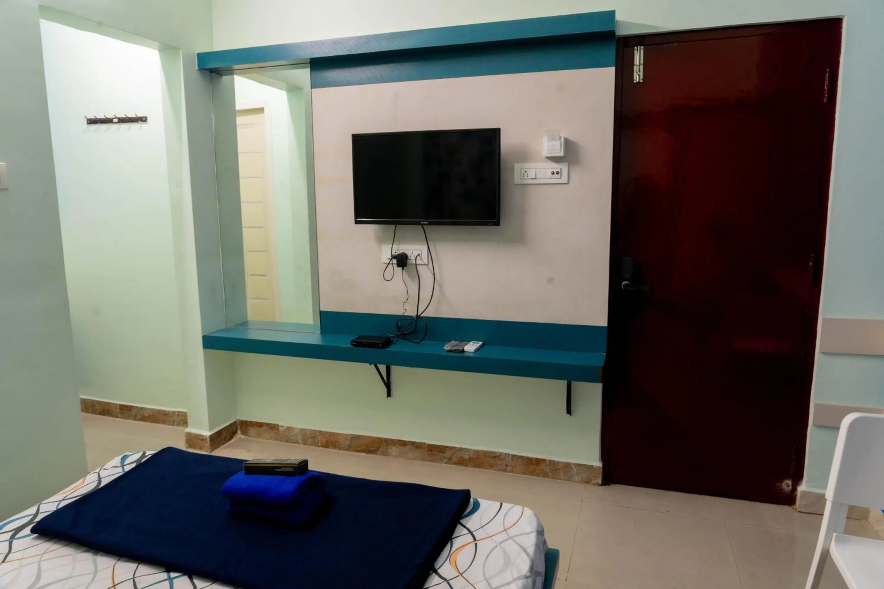 TV and multimedia, Bed in Sree Theja Residency