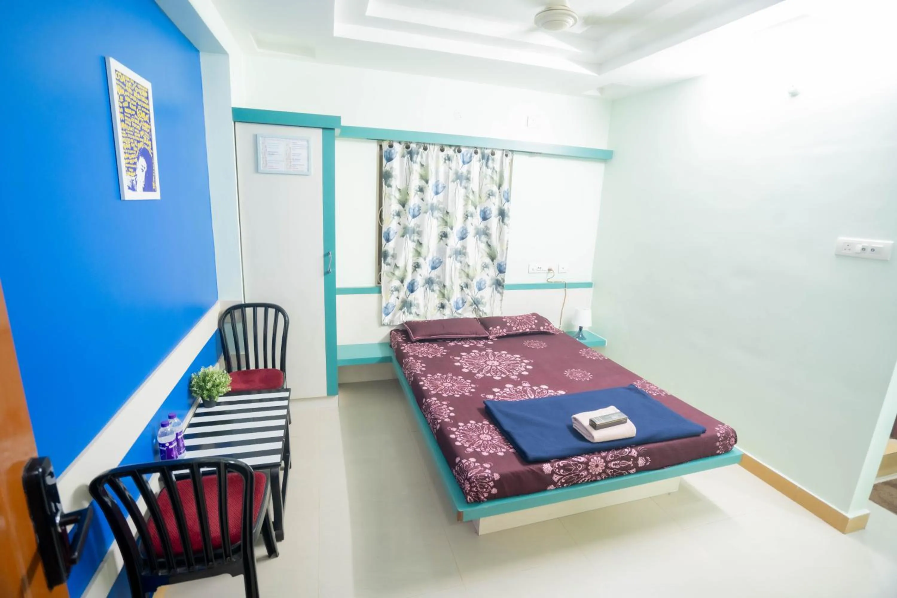 Bed in Sree Theja Residency