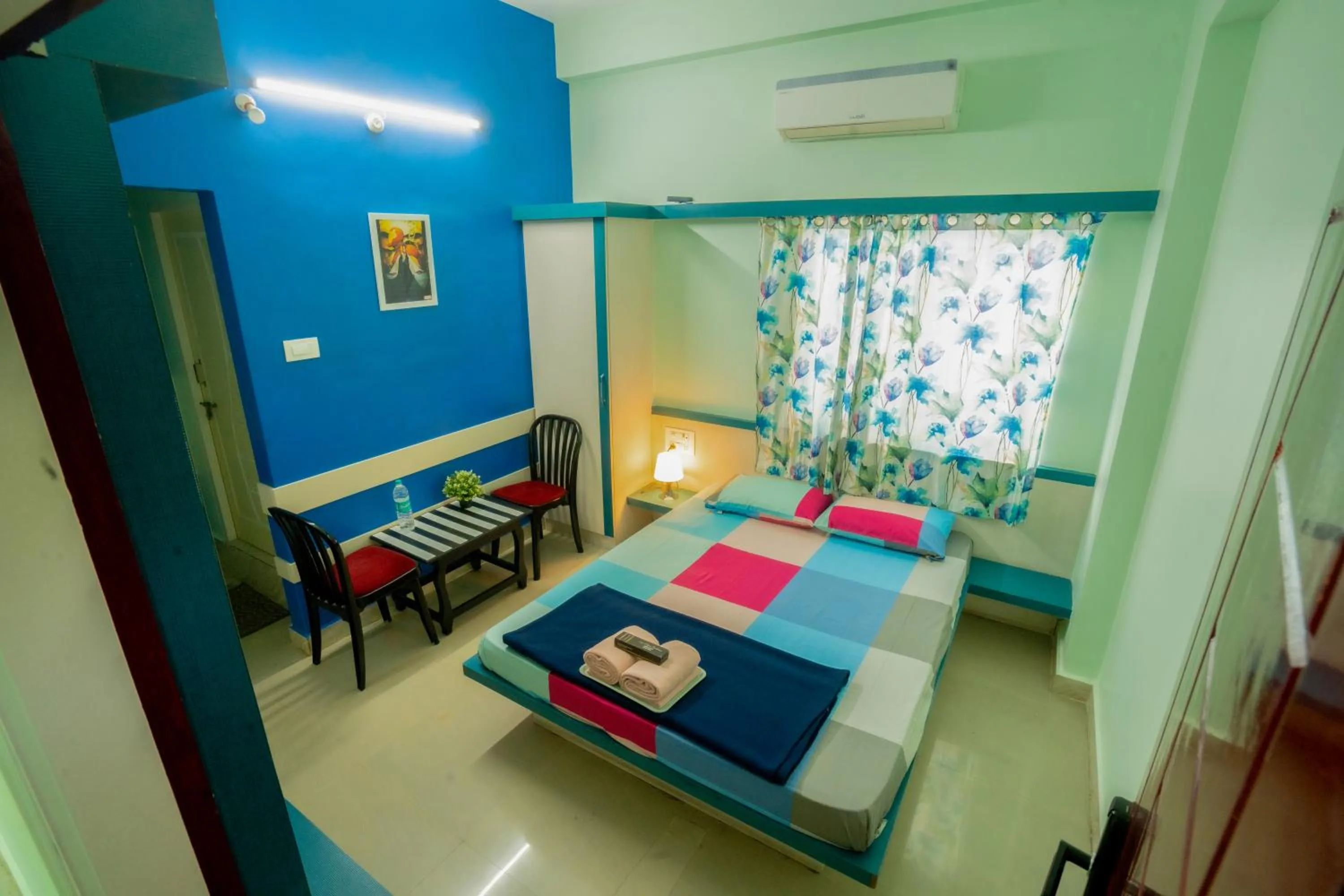 Bedroom, Bed in Sree Theja Residency