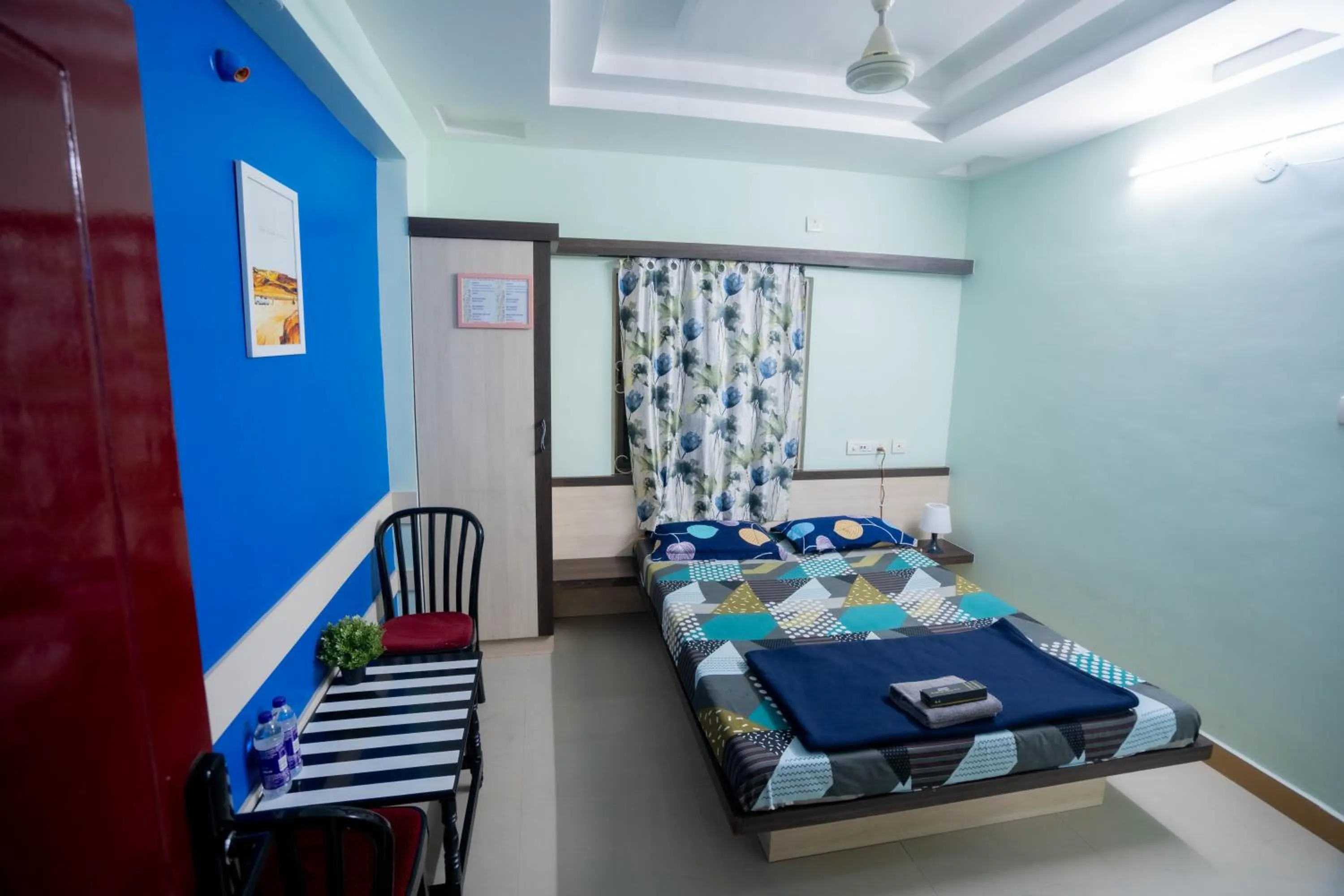 Bedroom, Bed in Sree Theja Residency