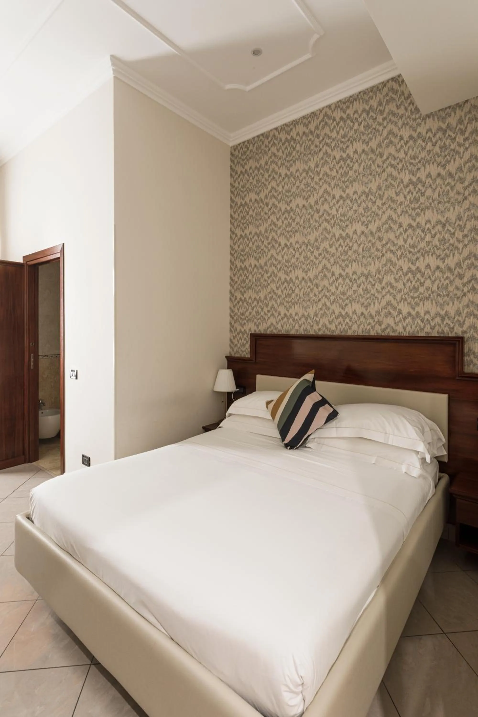 Bed in Glam Luxury Rome