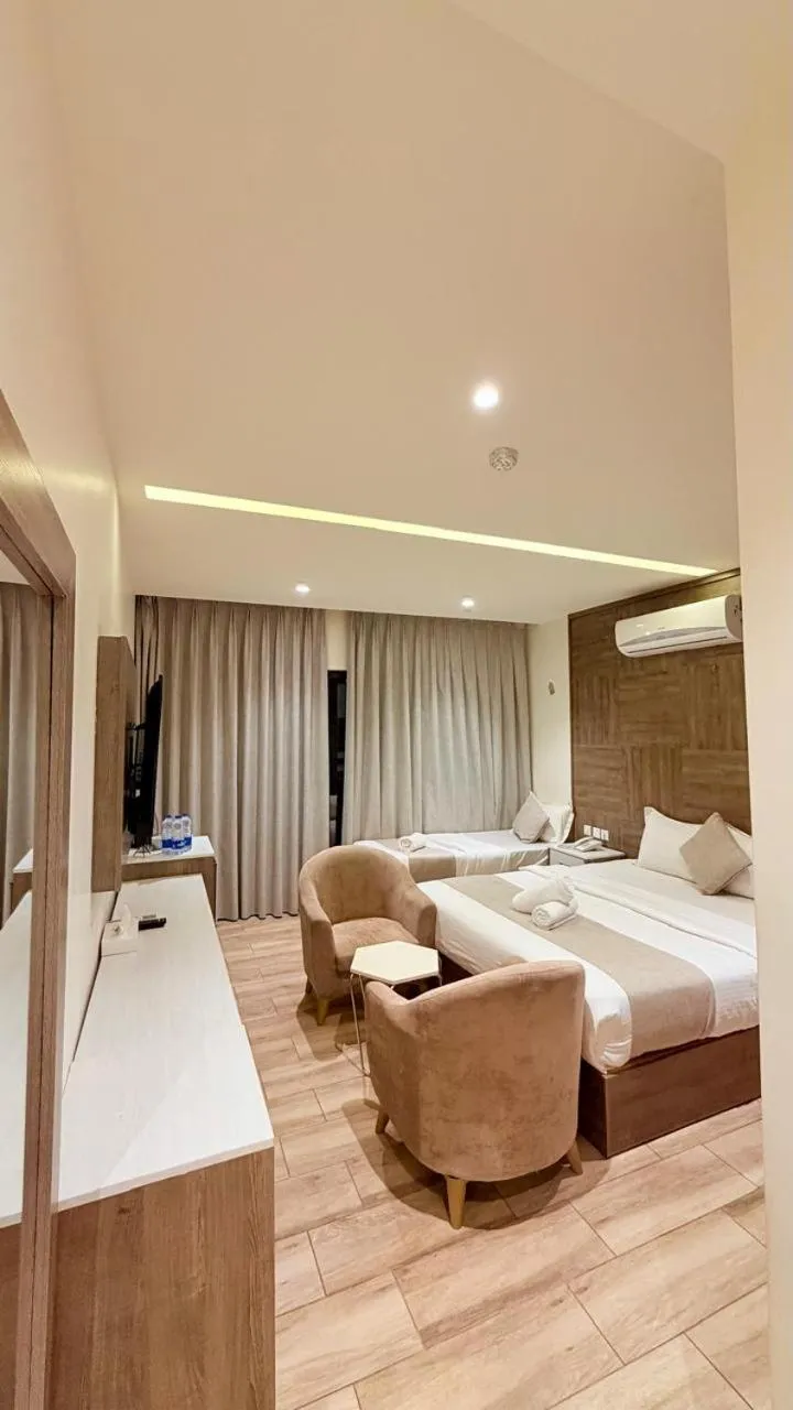 Photo of the whole room, Bed in Sky Hotel