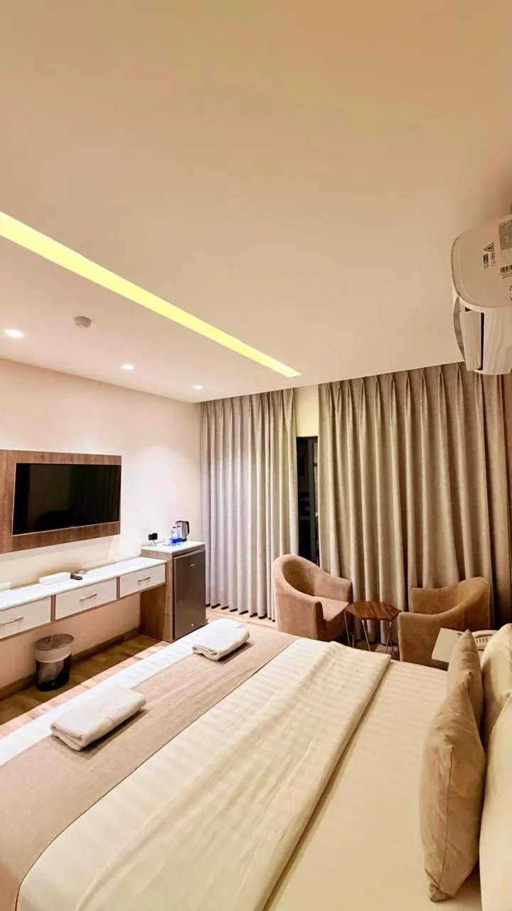 Photo of the whole room, Bed in Sky Hotel