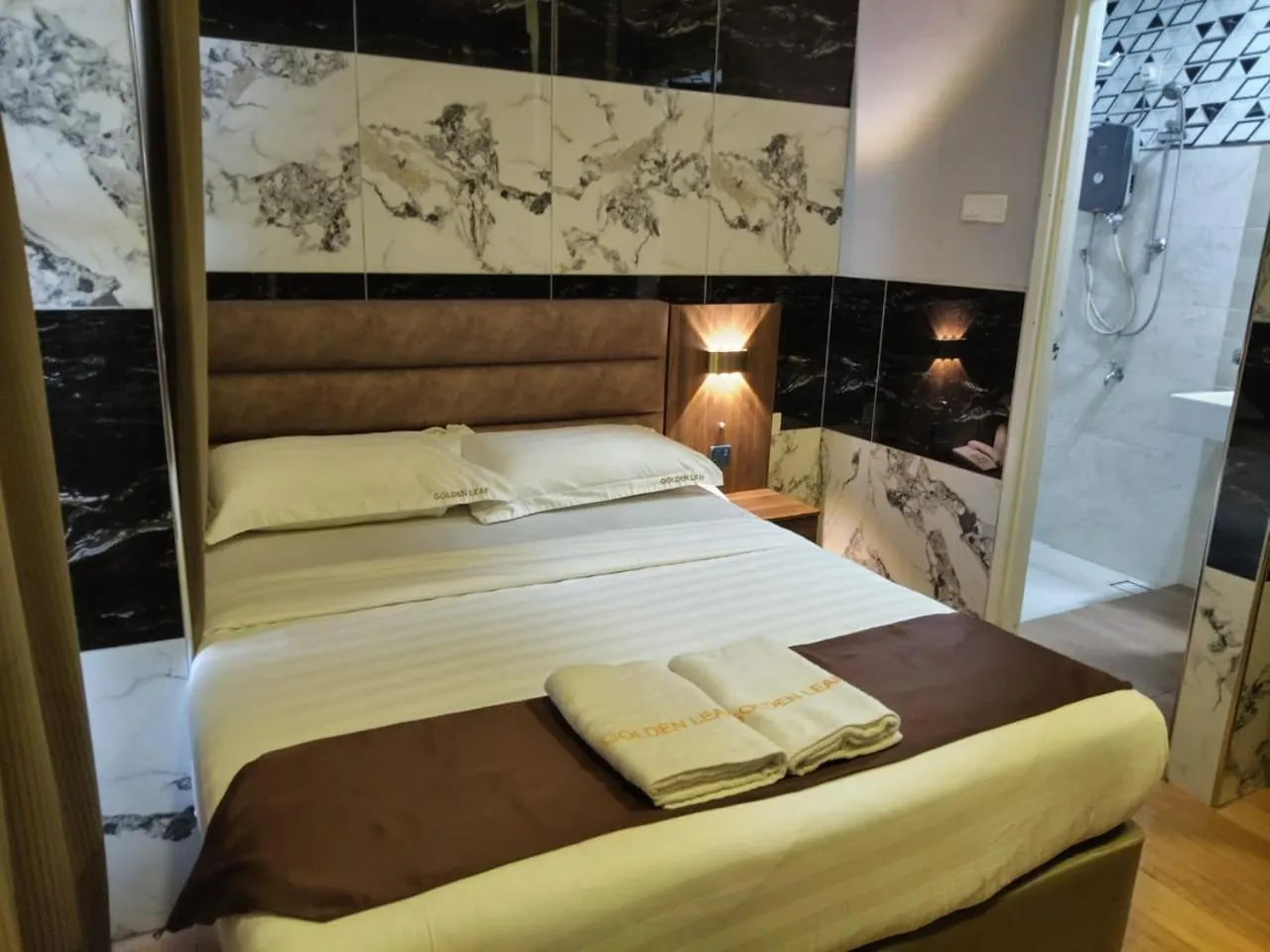 Bed in Golden Leaf Boutique Hotel Nusa Idaman Formerly Known as Ariana Hotel