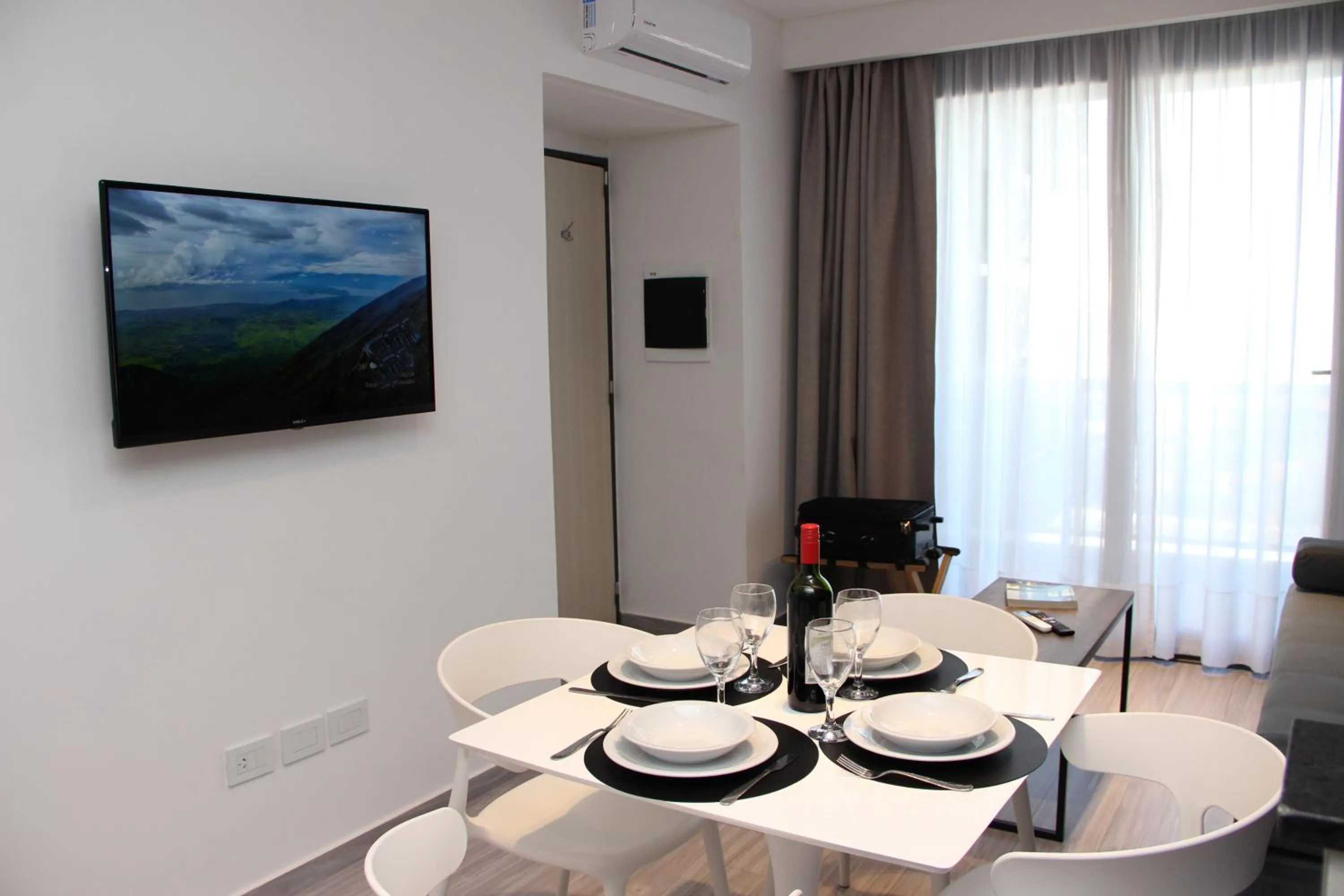 Dining area in In House BA - Le coq