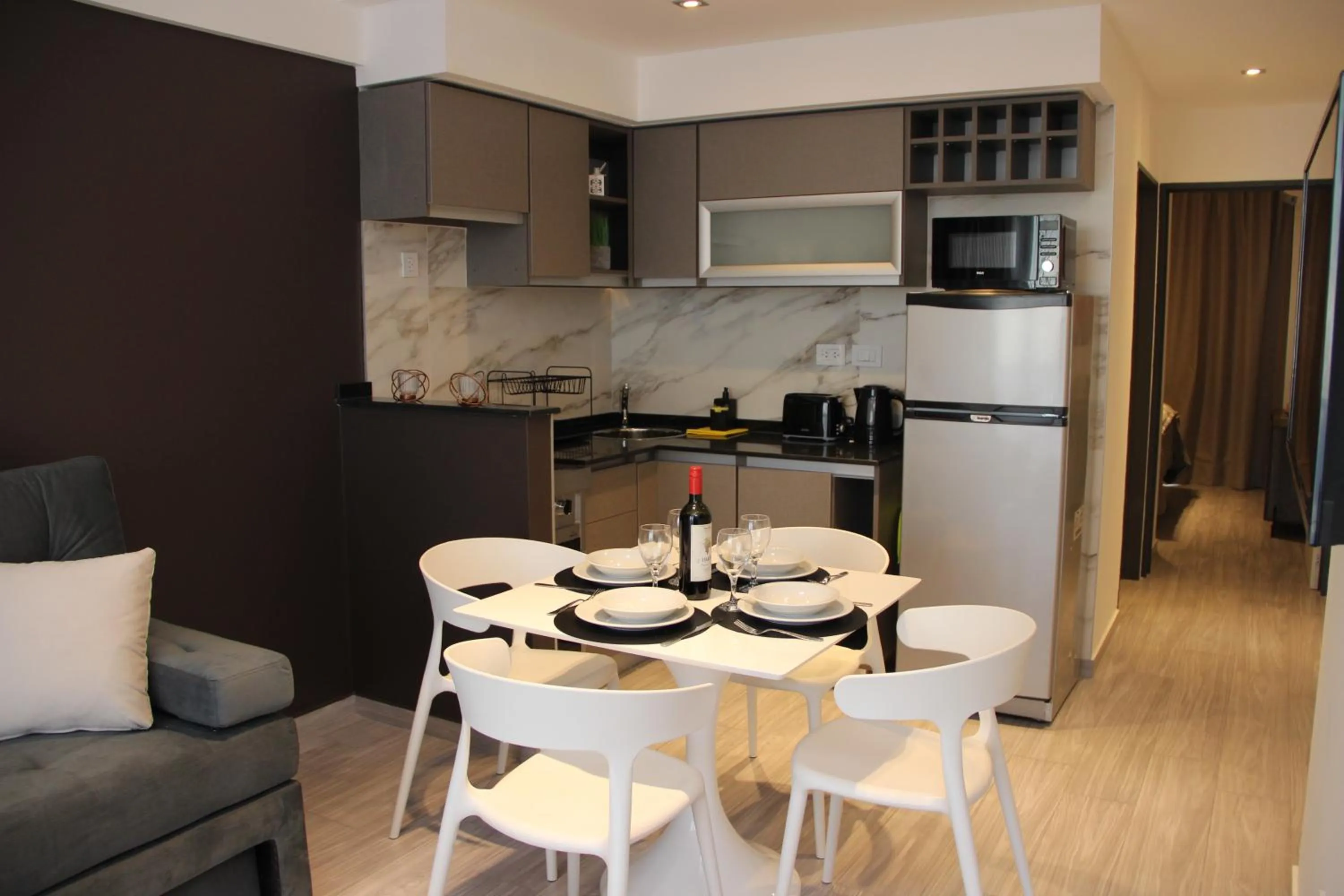 Dining area in In House BA - Le coq