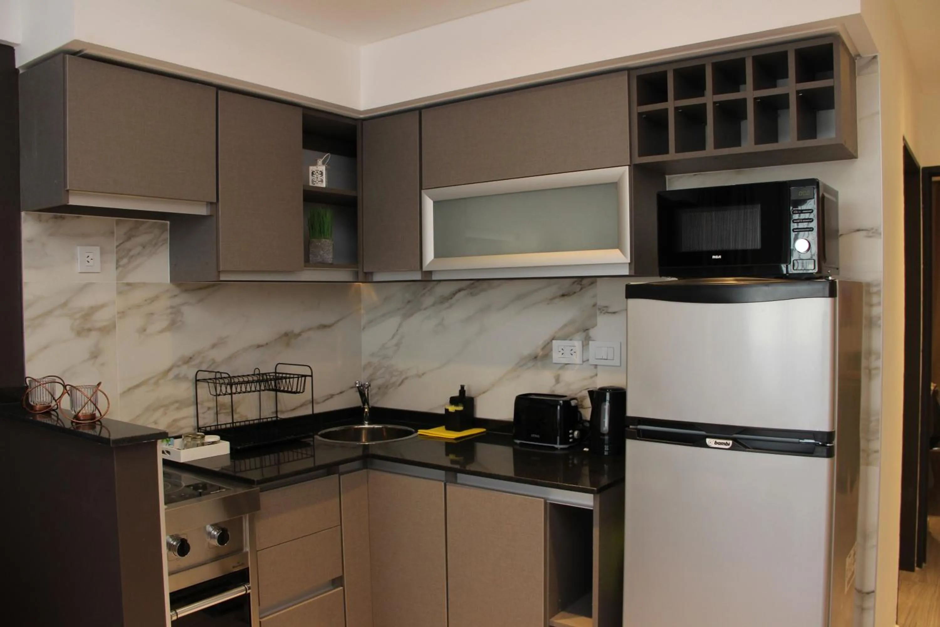 Kitchen or kitchenette in In House BA - Le coq