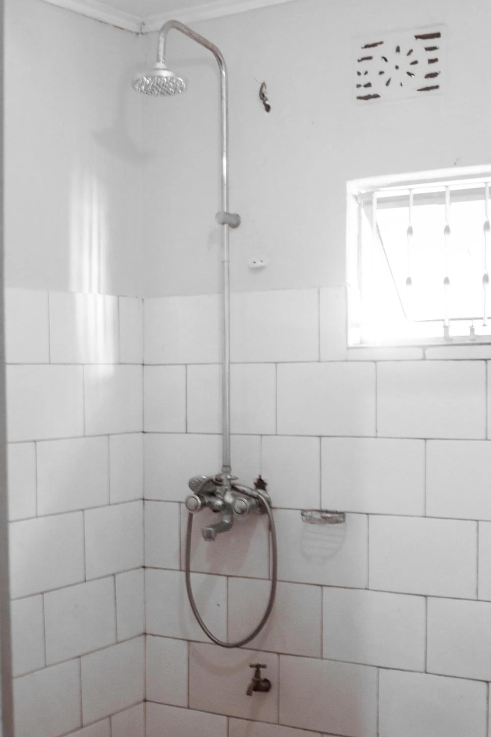 Shower in The Secret Garden Hotel Moshi