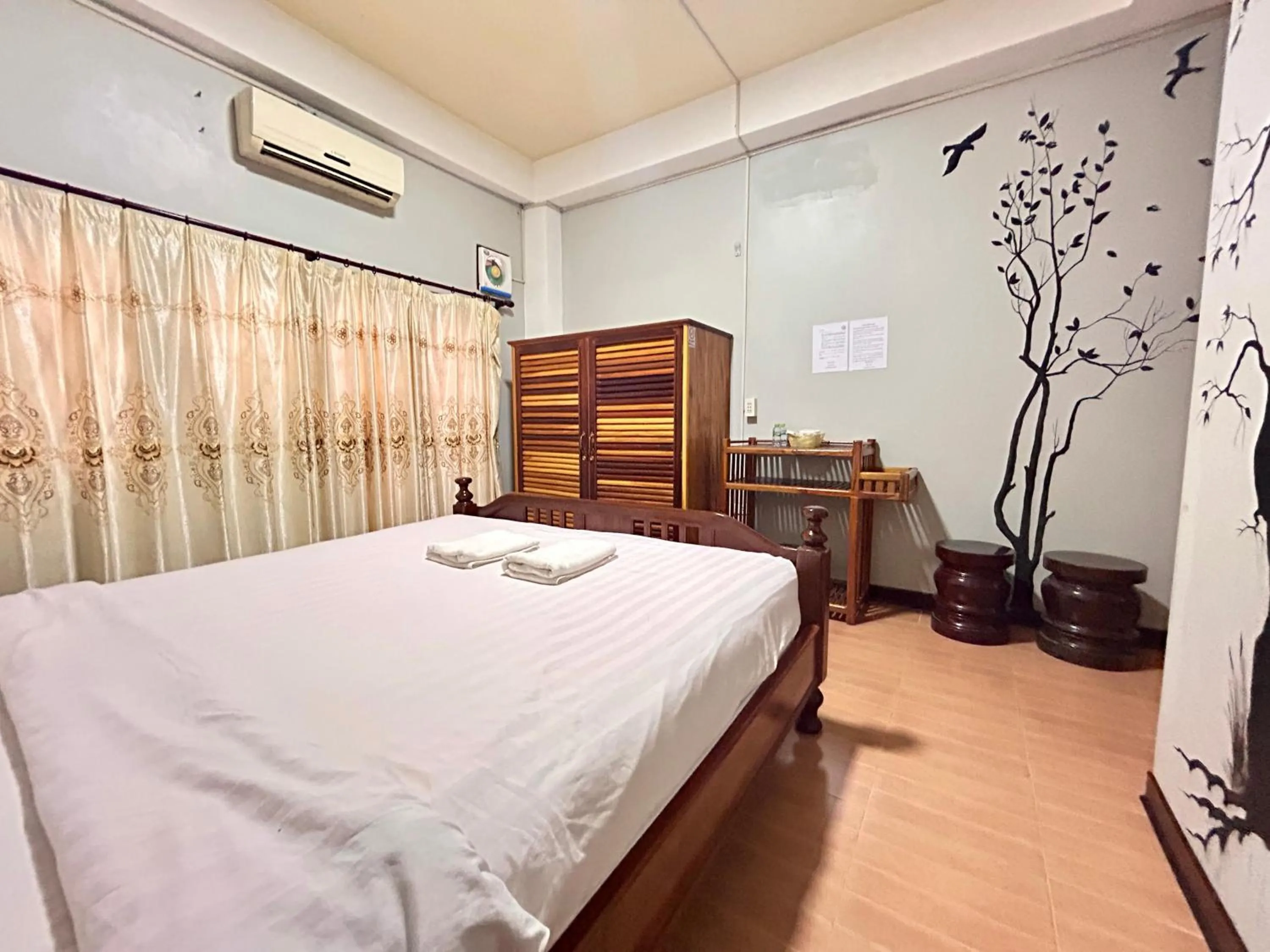 Bed in Domon Riverside Hotel