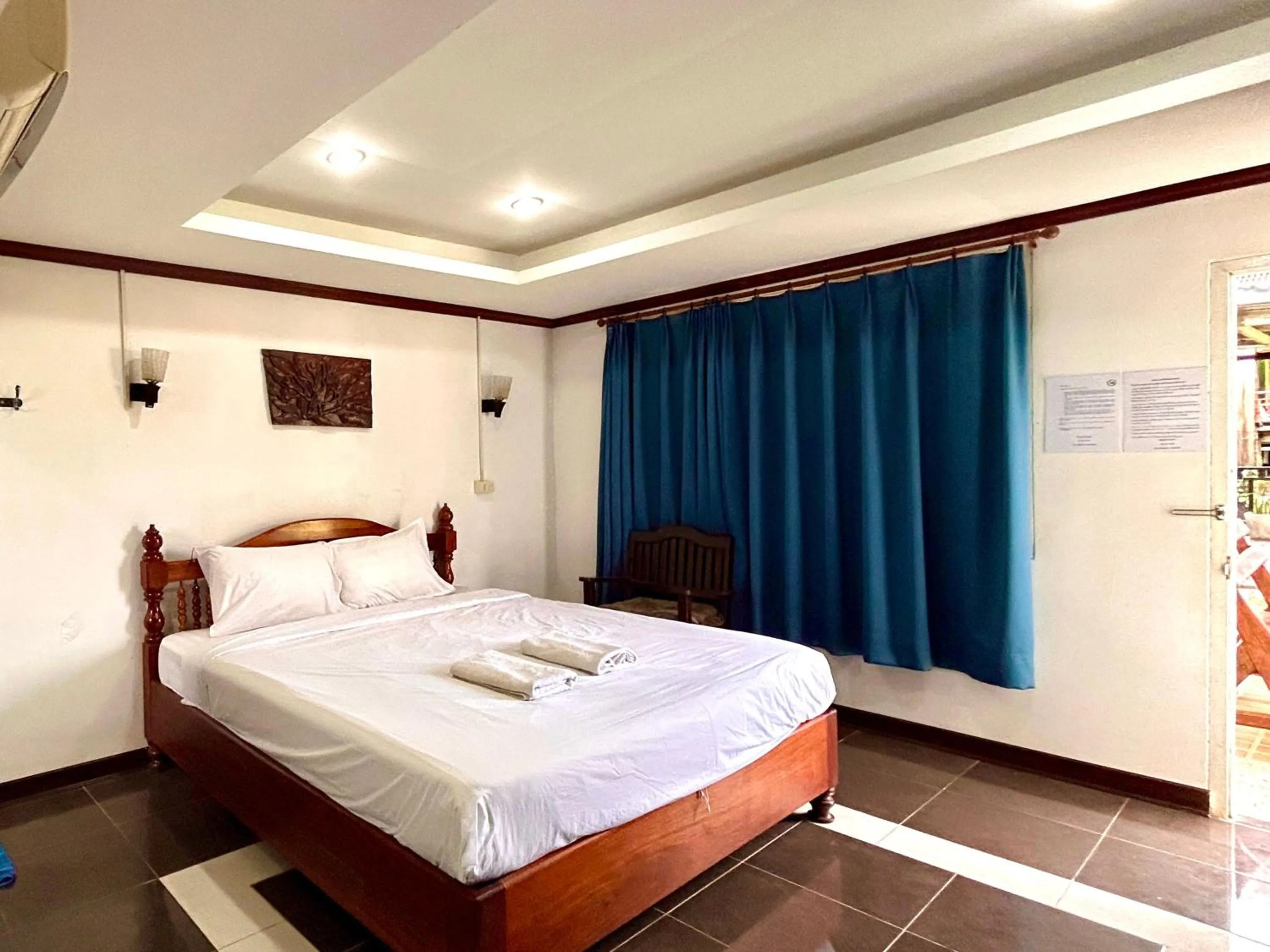 Bed in Domon Riverside Hotel