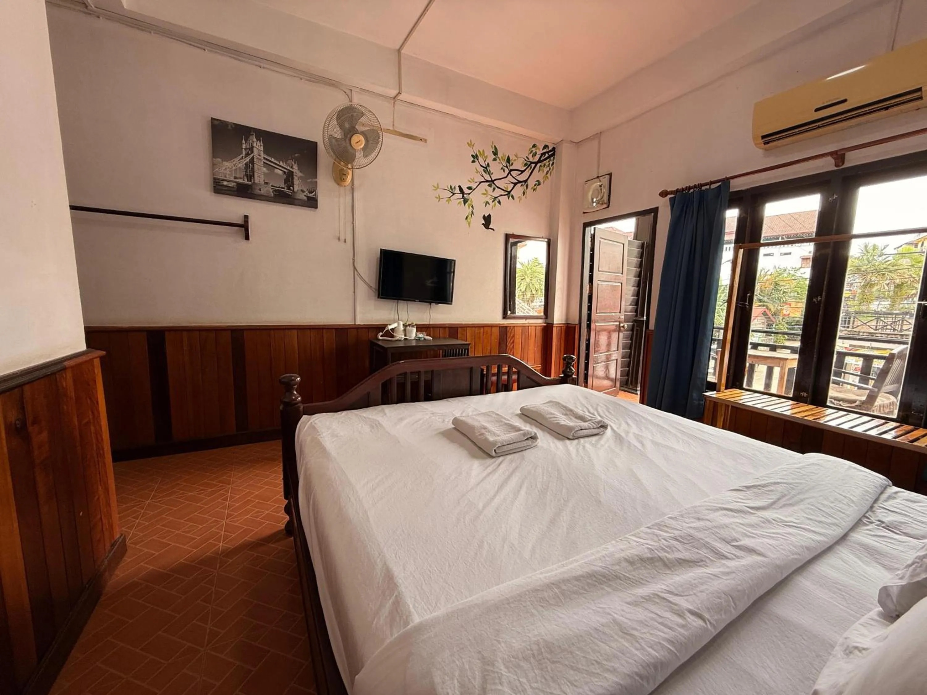 Bed in Domon Riverside Hotel