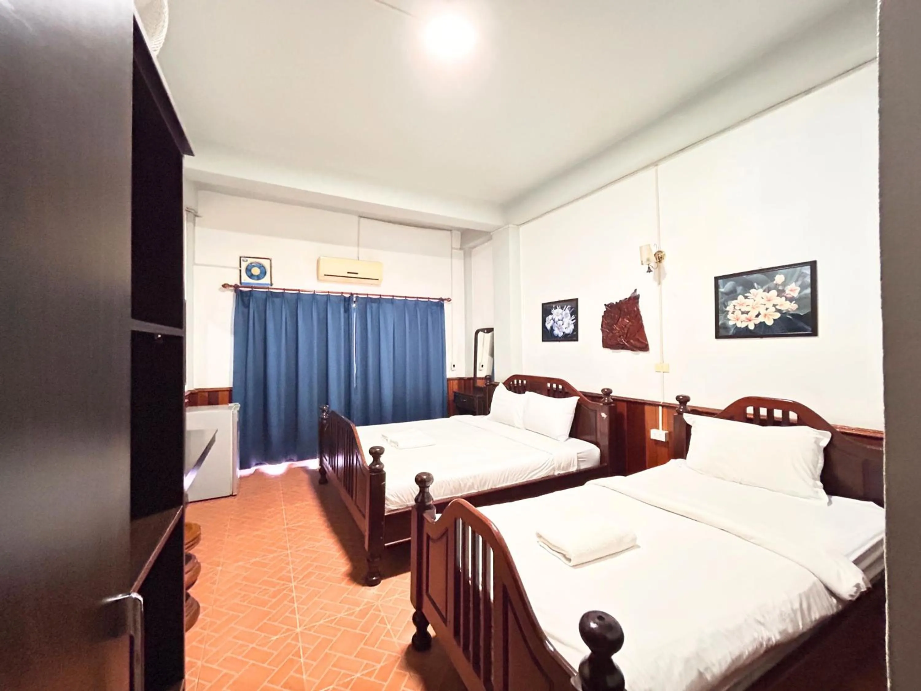 Bed in Domon Riverside Hotel