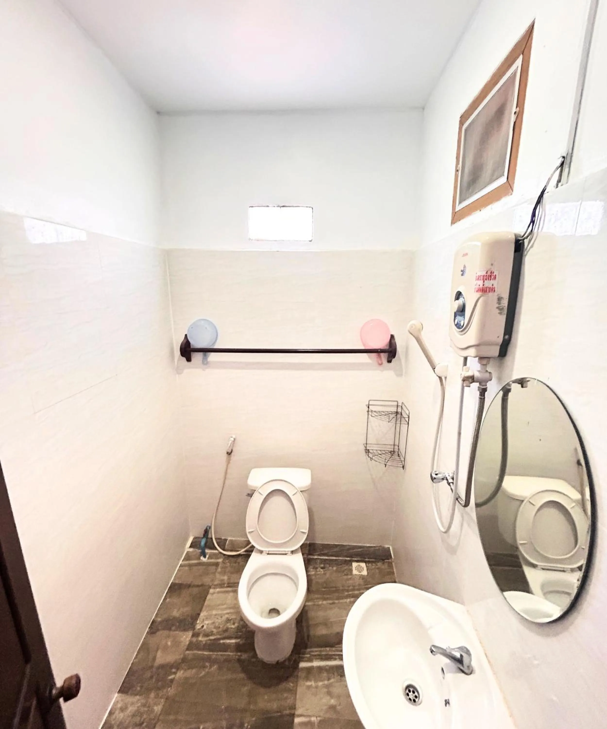 Shower in Domon Riverside Hotel