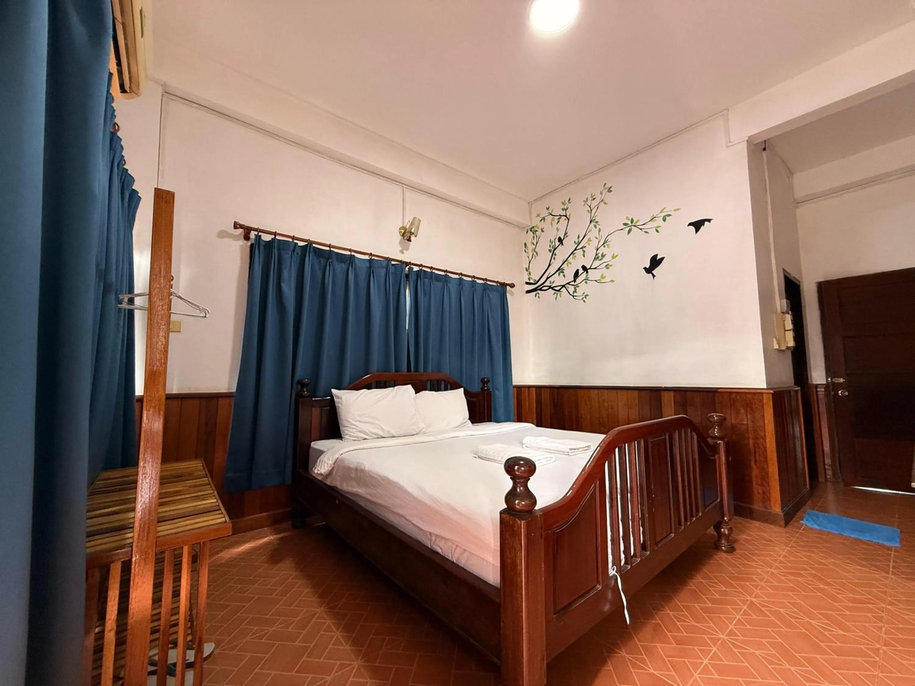 Bed in Domon Riverside Hotel