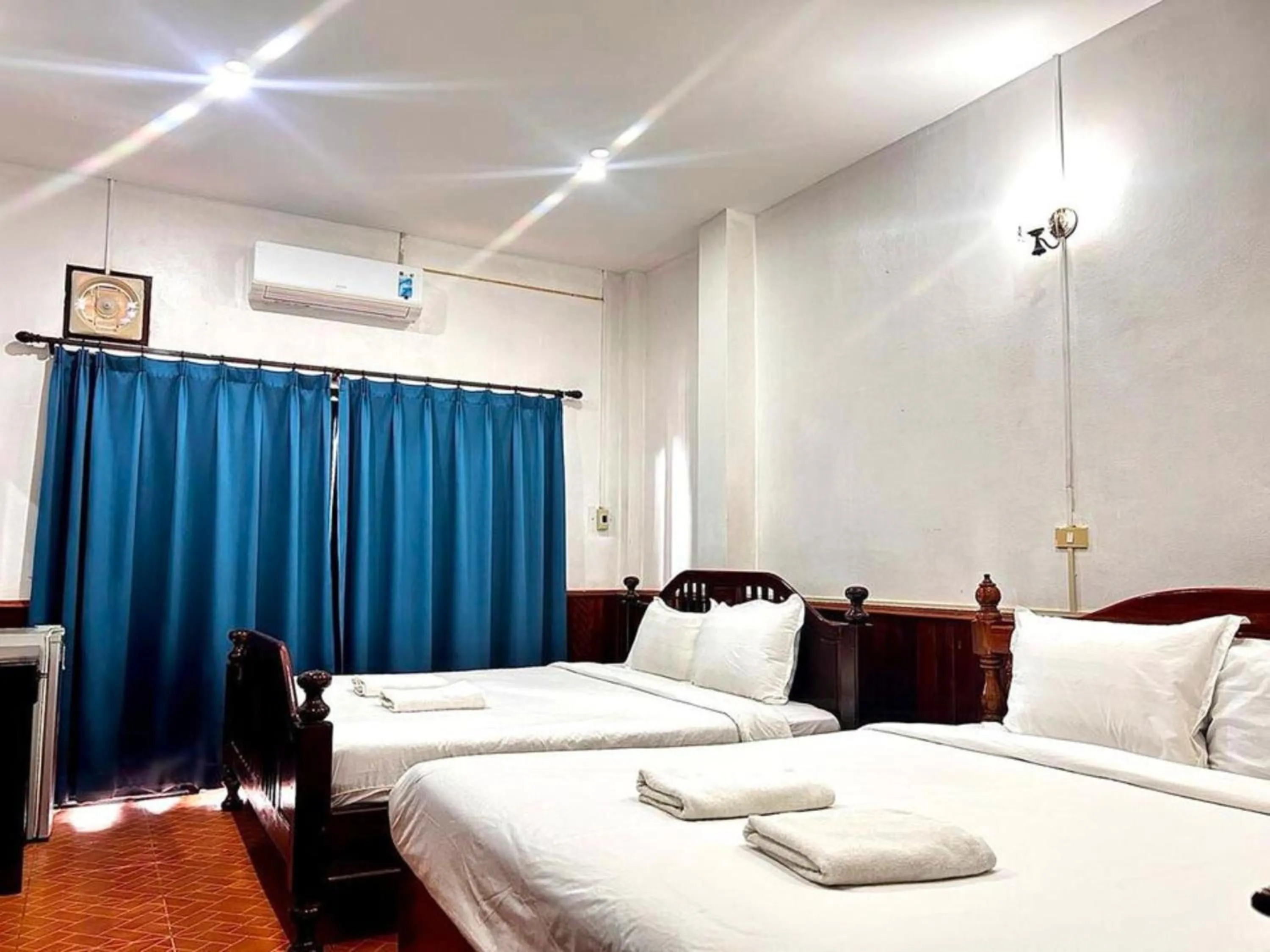 Bed in Domon Riverside Hotel