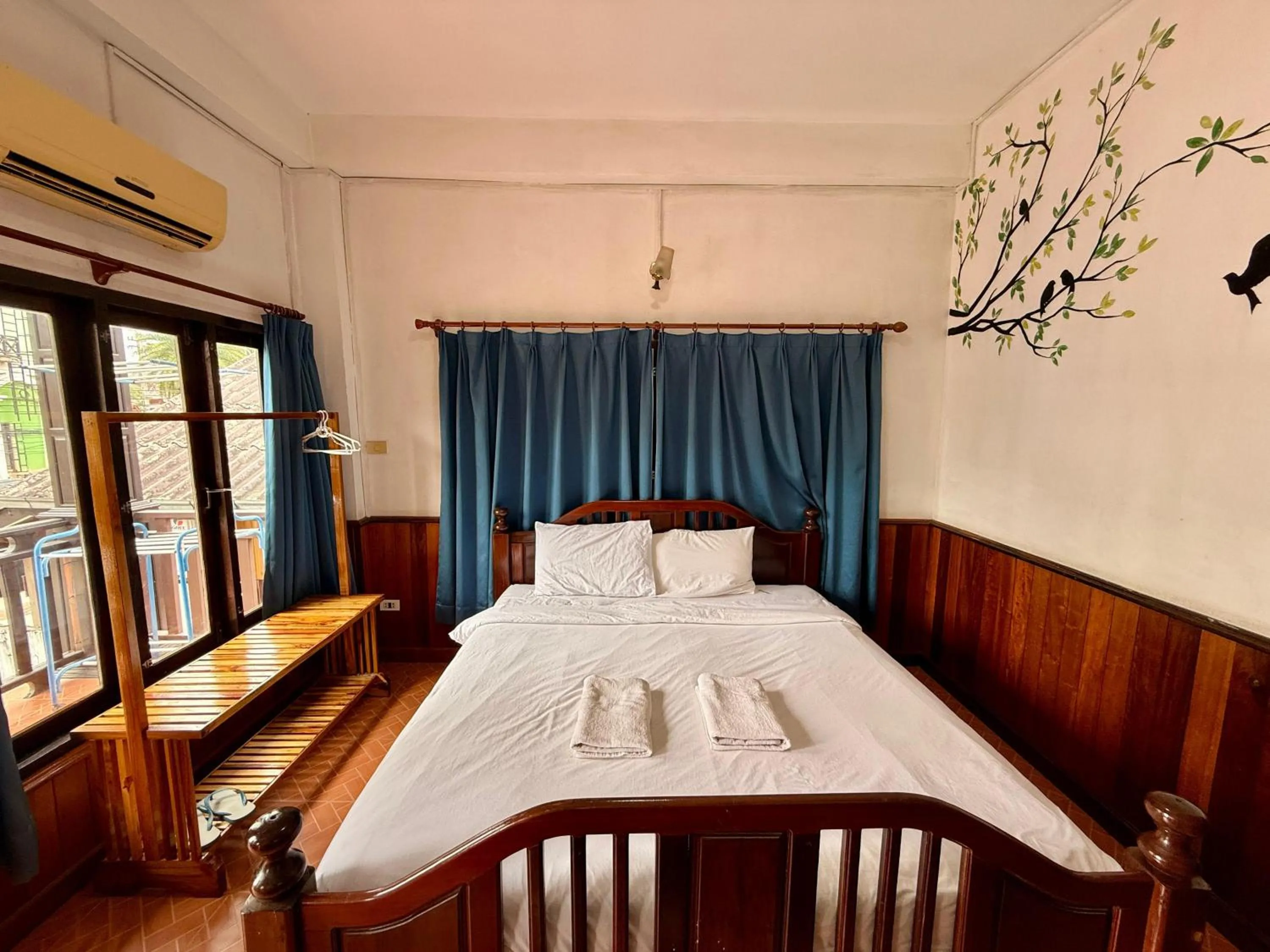 Bed in Domon Riverside Hotel