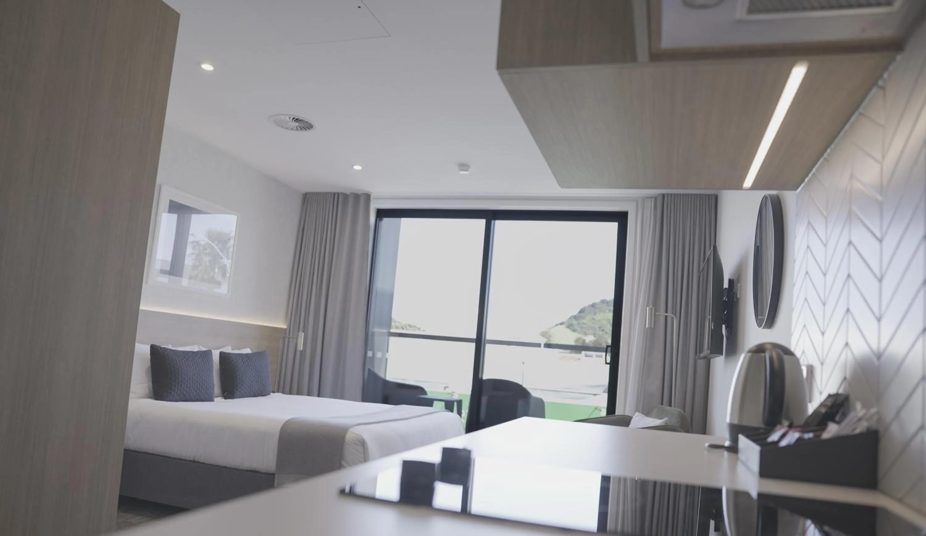 Bed in Quest Mt Maunganui