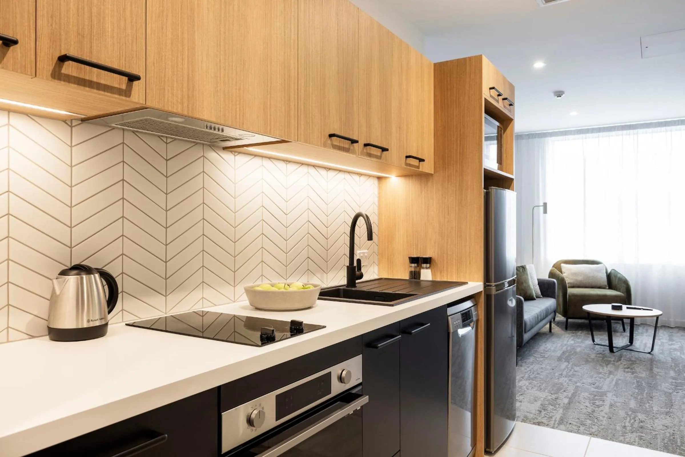 Kitchen or kitchenette in Quest Mt Maunganui