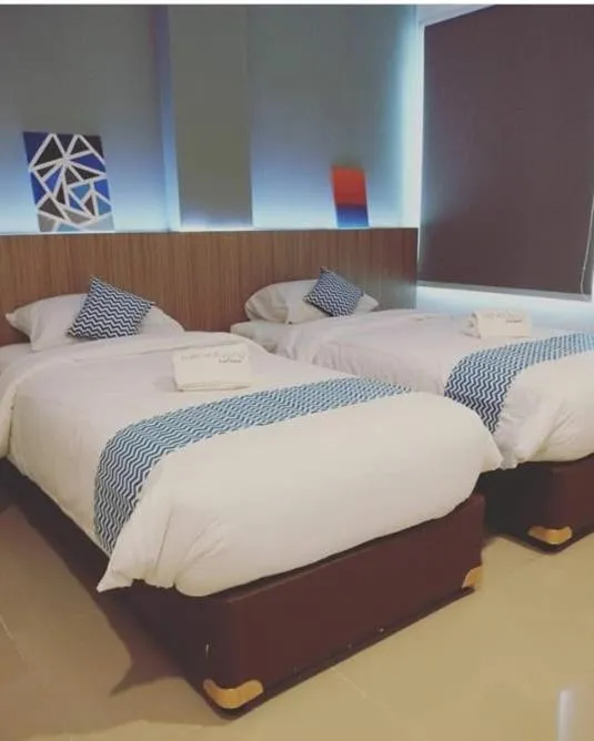 Bed in The Holiday Guest House