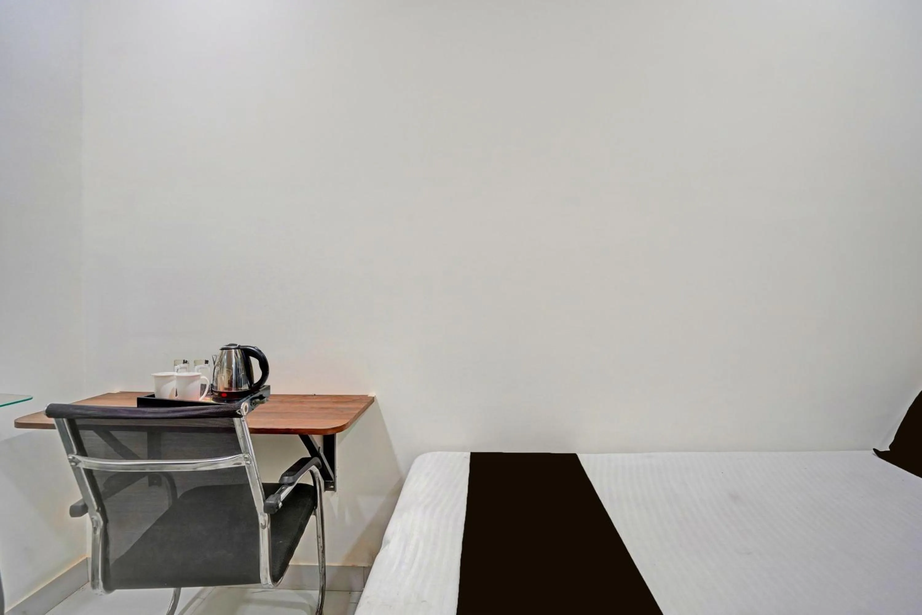 Bedroom in Collection O Dalhousie Square Kolkata Formerly G.N Palace