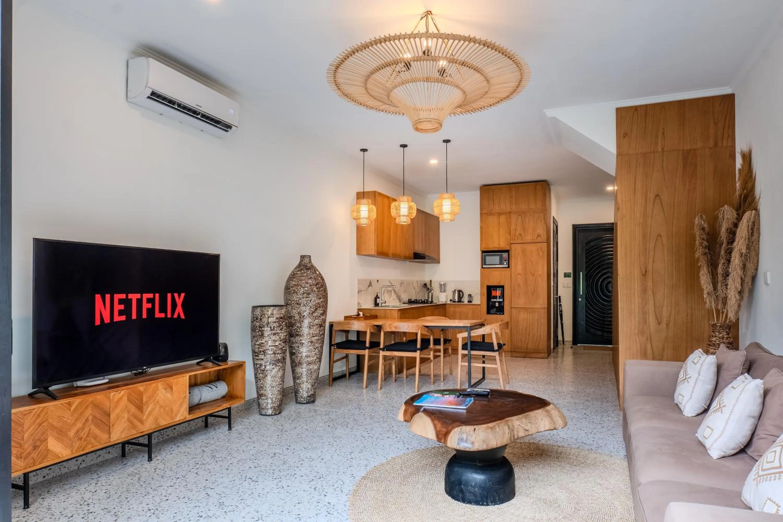 Communal lounge/ TV room in Sunny Village Batu Bolong