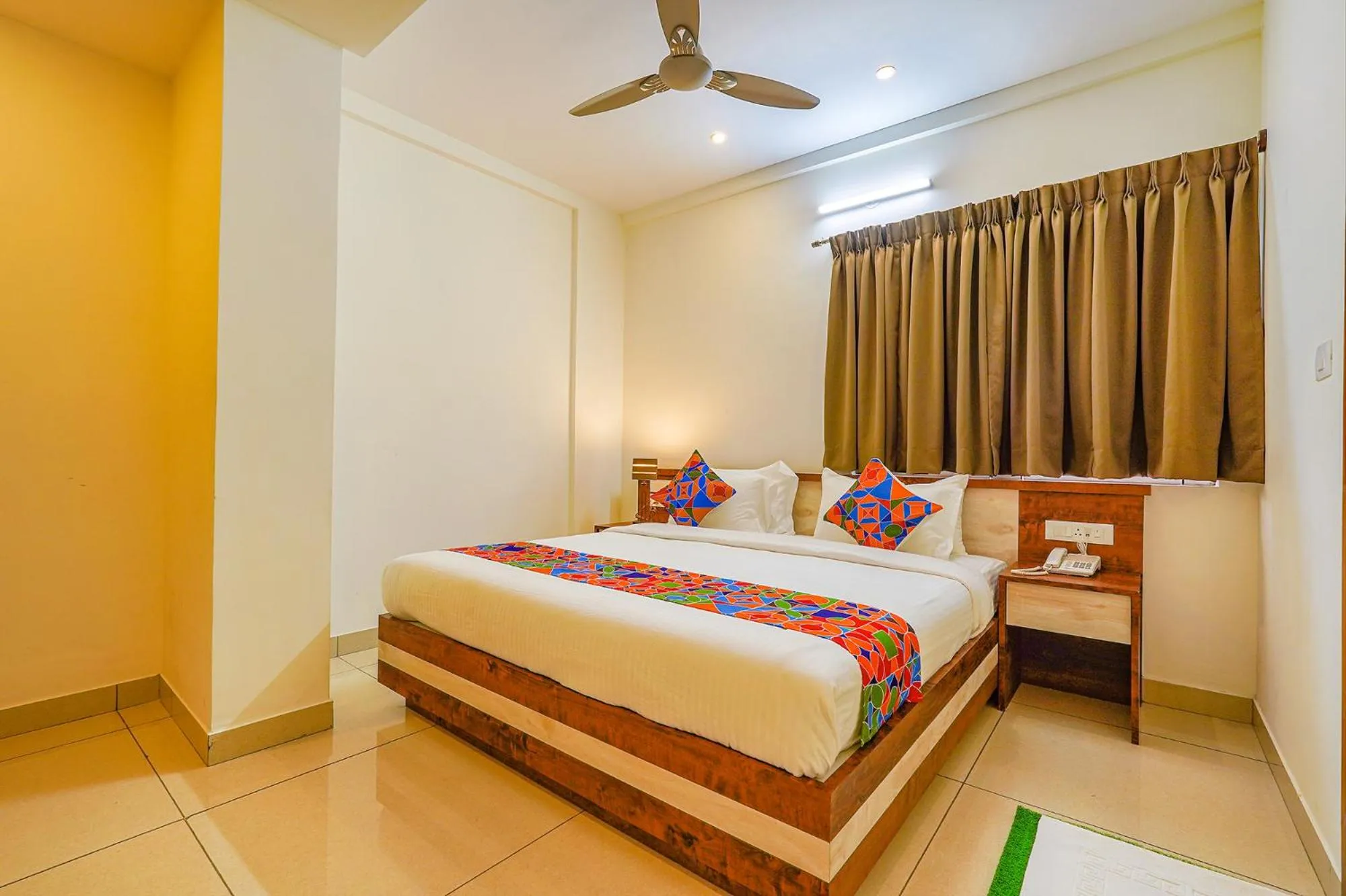 Photo of the whole room, Bed in FabHotel Shakthi Suites - Nr Jayadeva Hospital
