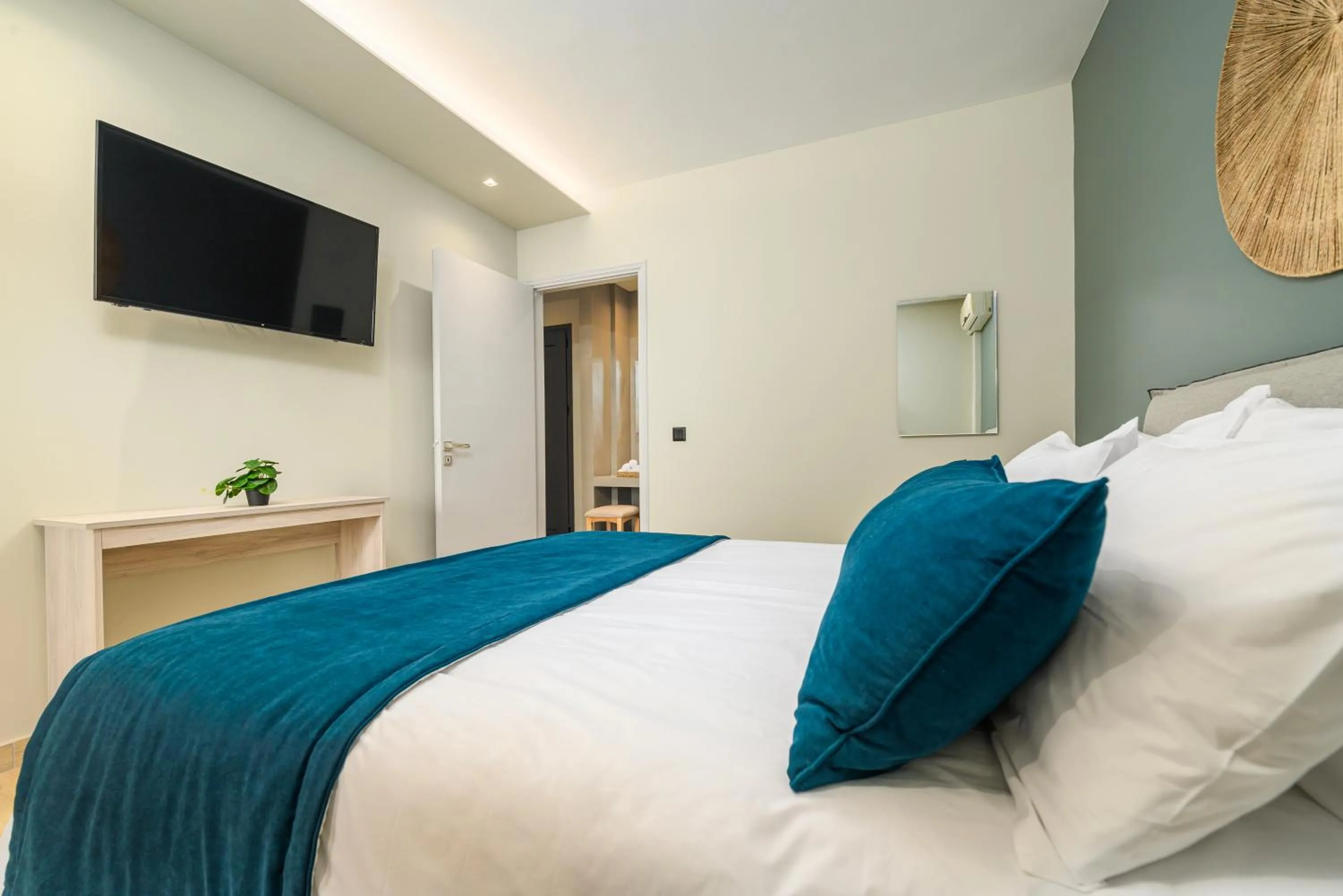 TV and multimedia, Bed in Nicolas Grand Suites, Adults Only