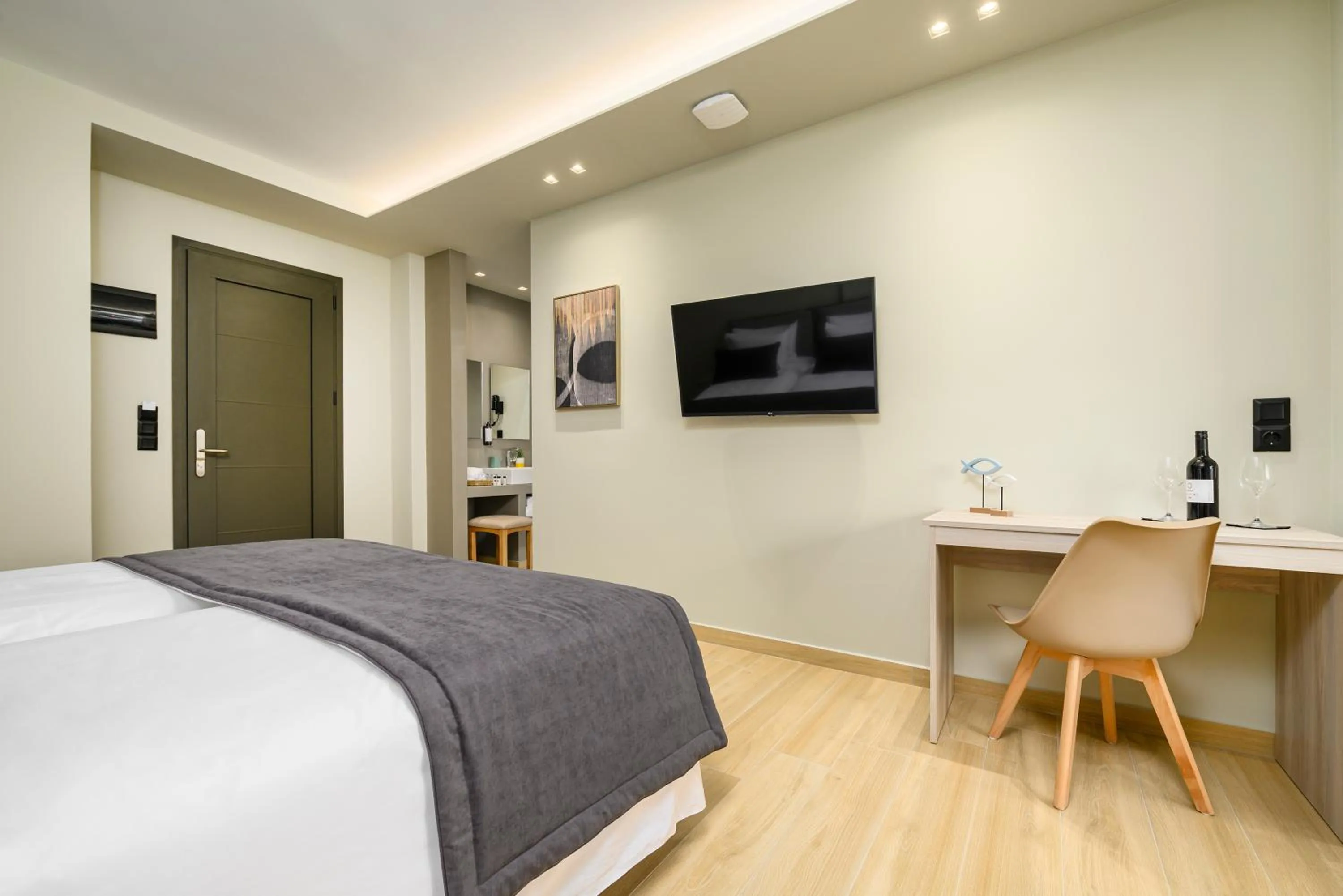 TV and multimedia, Bed in Nicolas Grand Suites, Adults Only