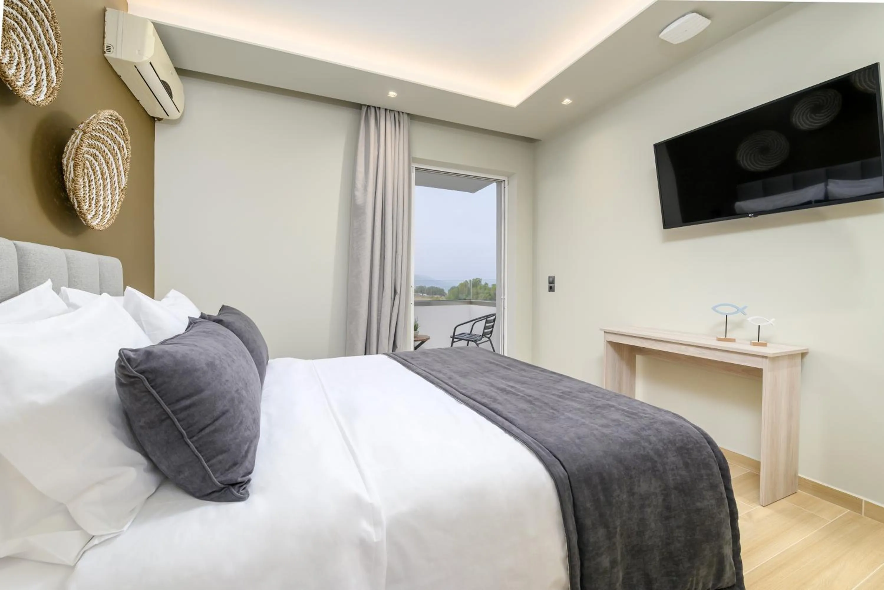 TV and multimedia, Bed in Nicolas Grand Suites, Adults Only