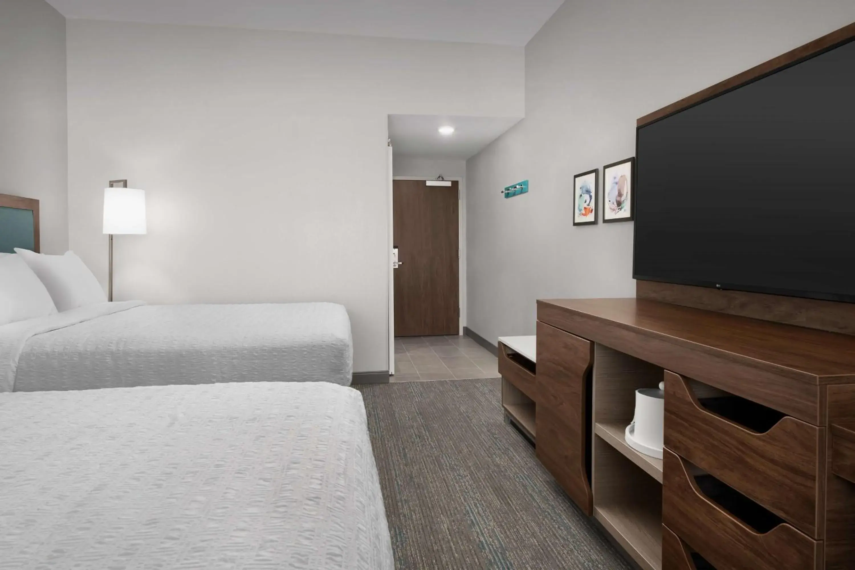 Queen Room with Two Queen Beds - Hearing Access in Hampton Inn Orlando Southeast Nona Queen Room with Two Queen Beds - Hearing Access in Hampton Inn Orlando Southeast Nona