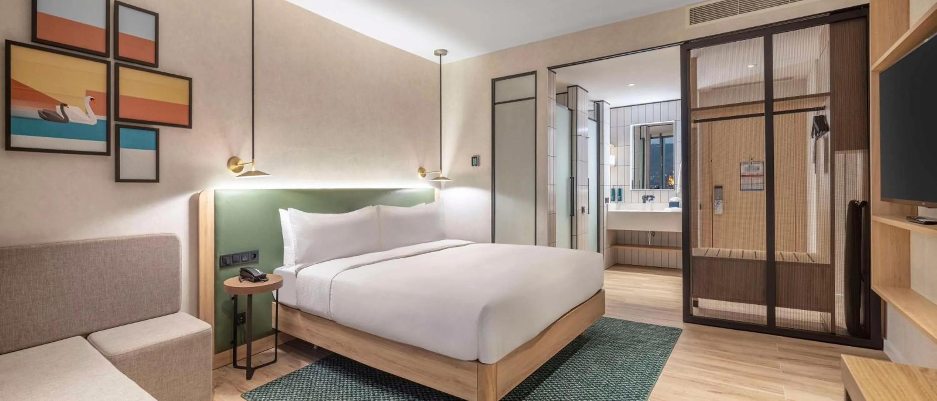 Living room, Bed in Hilton Garden Inn Tbilisi Riverview