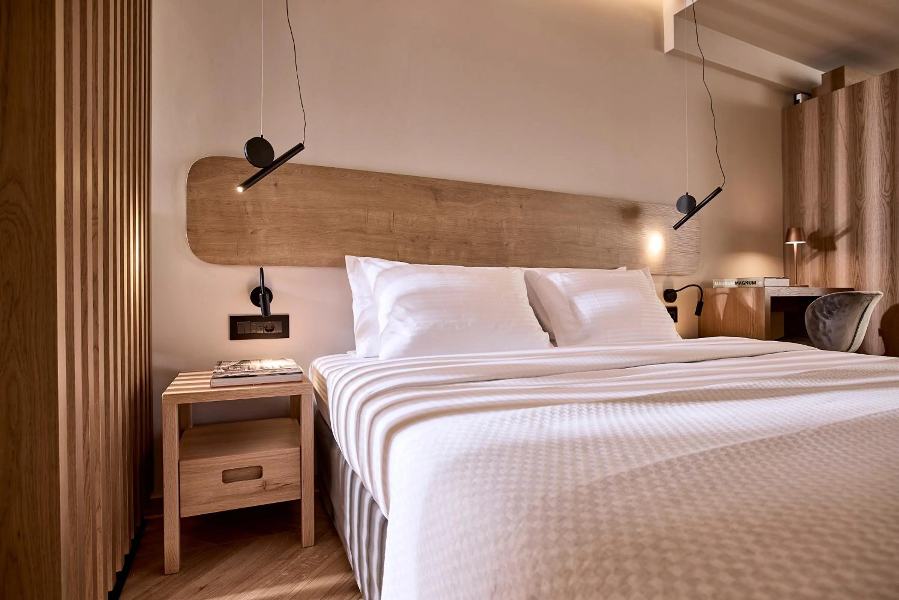 Bed in Cama Luxury Suites Kavouri