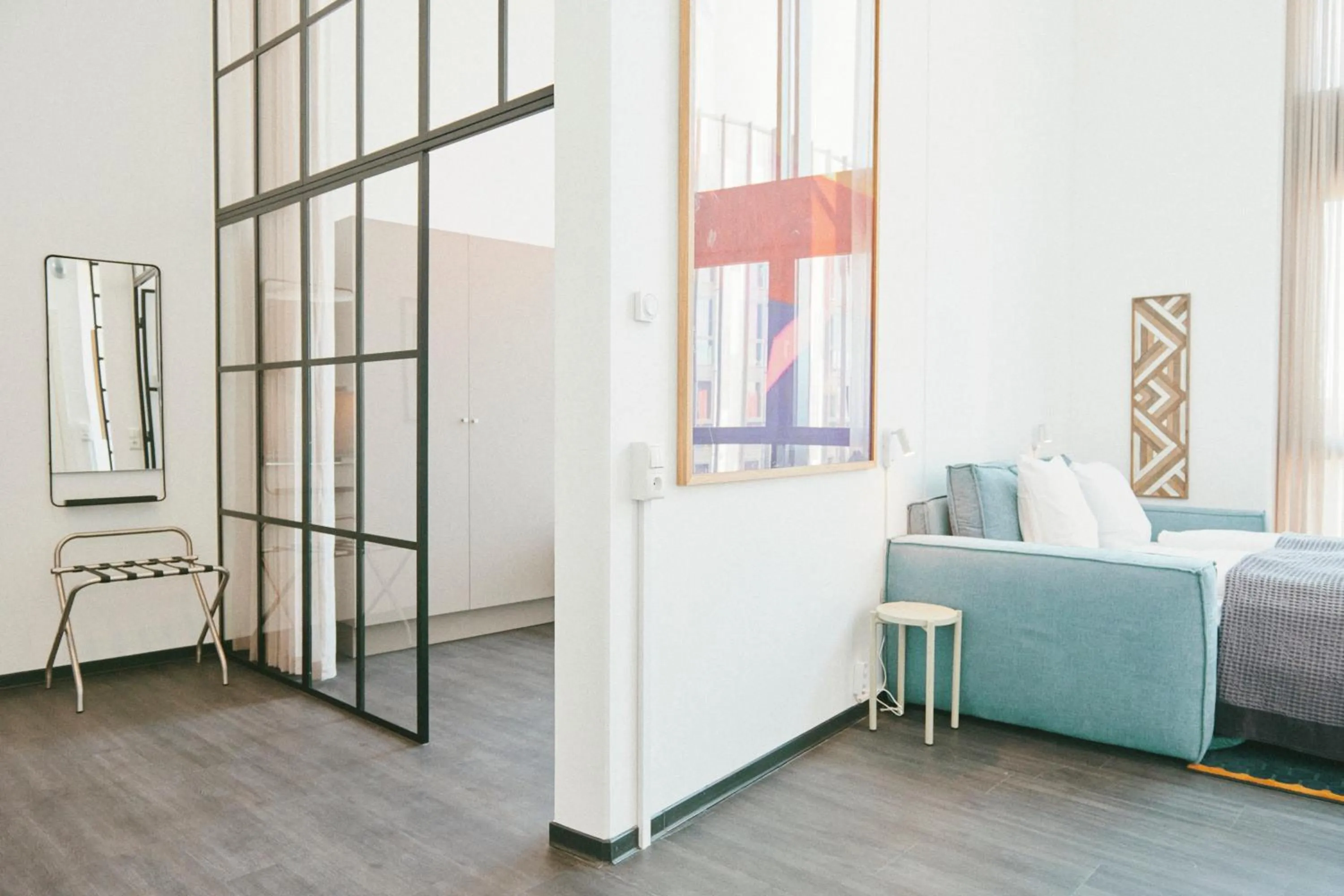 Living room, Bed in The Forest apartments by Daniel&Jacob's